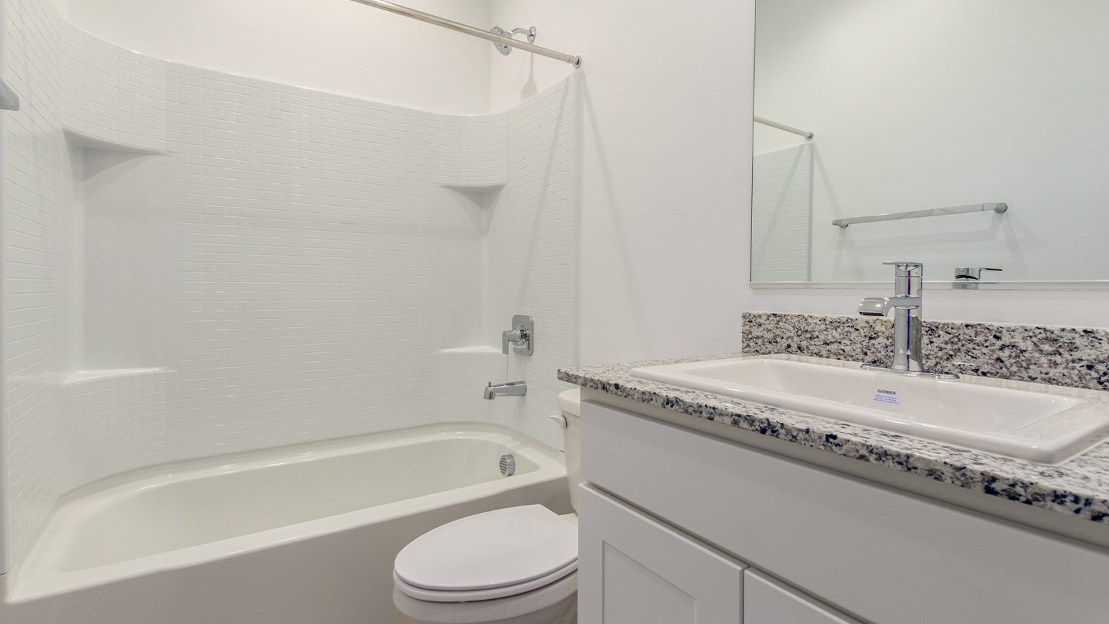 Experience the charm of The Cali, located within the peaceful Sycamore Vista community in the serene foothills of the Santa Rita Mountains, Arizona. This thoughtfully laid-out, single-story home offers 1,823 square feet of versatile living space designed to meet the needs of modern families.  Step into the inviting entryway, where you're welcomed by a spacious great room that serves as the heart of the home. The open-concept design connects the great room to the dining area and kitchen, creating a harmonious flow that's perfect for both entertaining and daily living. The kitchen is a true culinary haven, featuring a large island, granite countertops, and ample storage space with a walk-in pantry.  The Cali's four bedrooms are designed with relaxation in mind. The primary suite, tucked away from the other bedrooms, offers a private oasis complete with a walk-in closet and a well-appointed bathroom featuring dual vanities. The additional three bedrooms share a well-equipped bathroom and are situated to provide comfort and privacy for family members or guests.  Adding to the home's appeal are the premium standard features that come included in every Cali at Sycamore Vista. Enjoy the elegance of staggered wood-look ceramic tile flooring throughout the main living areas, complemented by Shaker-style cabinetry in the kitchen and bathrooms. The kitchen is further enhanced by an open single basin stainless steel sink paired with a water filtration system, making both cooking and cleanup a breeze. The energy-efficient design includes spray foam insulation, a tankless water heater, and LED lighting throughout, all contributing to lower utility costs and a more sustainable lifestyle.  Outdoor living is a breeze with the covered patio, easily accessible from the dining room, providing the perfect spot for morning coffee or evening gatherings. The three-car garage offers plenty of space for vehicles and storage, ensuring that everything you need is within easy reach.  Sycamore Vista's location offers a unique blend of tranquility and convenience, making The Cali an ideal choice for those seeking a peaceful retreat with easy access to modern amenities. Whether you're relaxing indoors or enjoying the outdoor beauty of Arizona, The Cali is a home that combines style, comfort, and functionality in every detail.