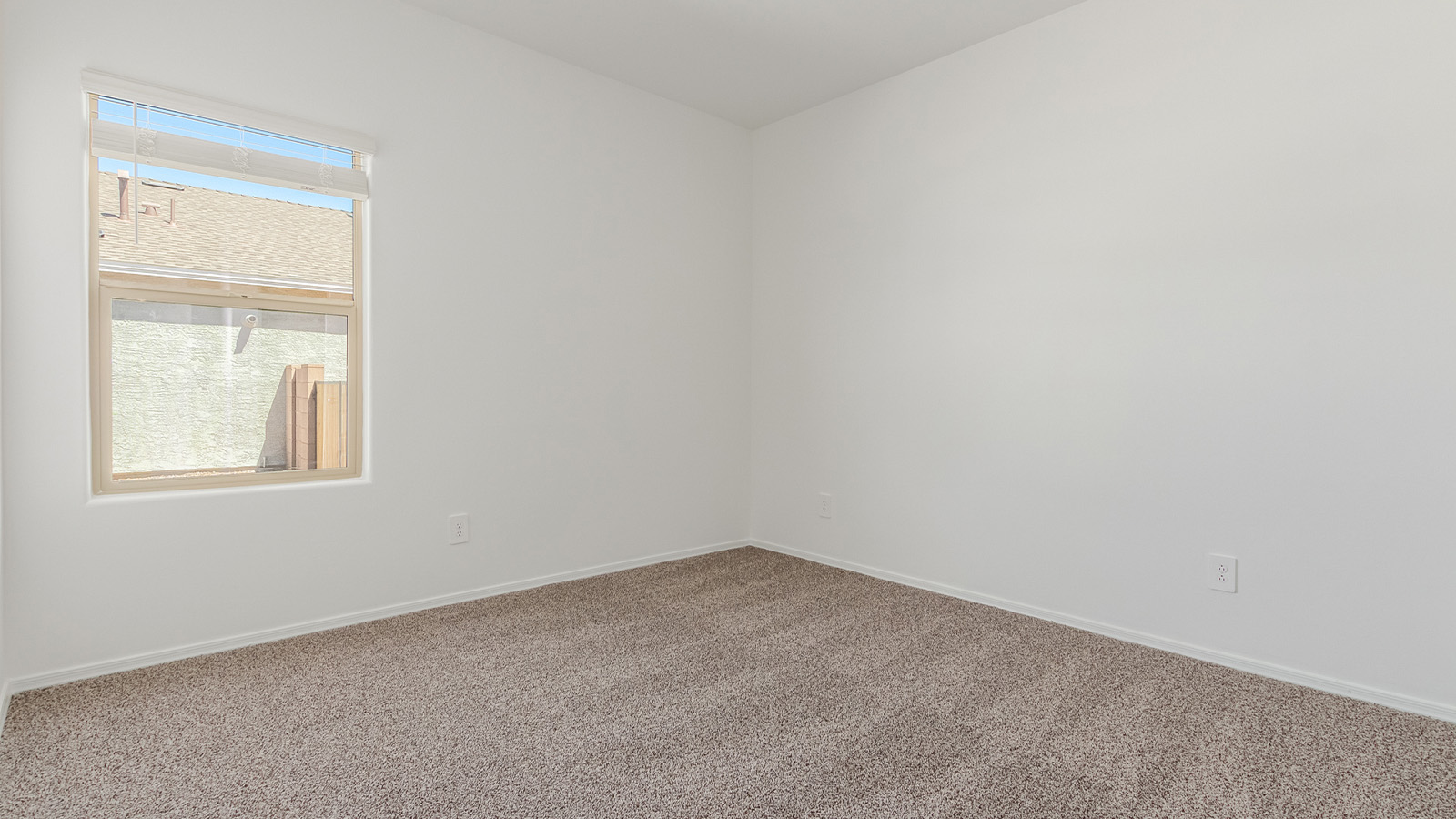 Experience the charm of The Cali, located within the peaceful Sycamore Vista community in the serene foothills of the Santa Rita Mountains, Arizona. This thoughtfully laid-out, single-story home offers 1,823 square feet of versatile living space designed to meet the needs of modern families.  Step into the inviting entryway, where you're welcomed by a spacious great room that serves as the heart of the home. The open-concept design connects the great room to the dining area and kitchen, creating a harmonious flow that's perfect for both entertaining and daily living. The kitchen is a true culinary haven, featuring a large island, granite countertops, and ample storage space with a walk-in pantry.  The Cali's four bedrooms are designed with relaxation in mind. The primary suite, tucked away from the other bedrooms, offers a private oasis complete with a walk-in closet and a well-appointed bathroom featuring dual vanities. The additional three bedrooms share a well-equipped bathroom and are situated to provide comfort and privacy for family members or guests.  Adding to the home's appeal are the premium standard features that come included in every Cali at Sycamore Vista. Enjoy the elegance of staggered wood-look ceramic tile flooring throughout the main living areas, complemented by Shaker-style cabinetry in the kitchen and bathrooms. The kitchen is further enhanced by an open single basin stainless steel sink paired with a water filtration system, making both cooking and cleanup a breeze. The energy-efficient design includes spray foam insulation, a tankless water heater, and LED lighting throughout, all contributing to lower utility costs and a more sustainable lifestyle.  Outdoor living is a breeze with the covered patio, easily accessible from the dining room, providing the perfect spot for morning coffee or evening gatherings. The three-car garage offers plenty of space for vehicles and storage, ensuring that everything you need is within easy reach.  Sycamore Vista's location offers a unique blend of tranquility and convenience, making The Cali an ideal choice for those seeking a peaceful retreat with easy access to modern amenities. Whether you're relaxing indoors or enjoying the outdoor beauty of Arizona, The Cali is a home that combines style, comfort, and functionality in every detail.