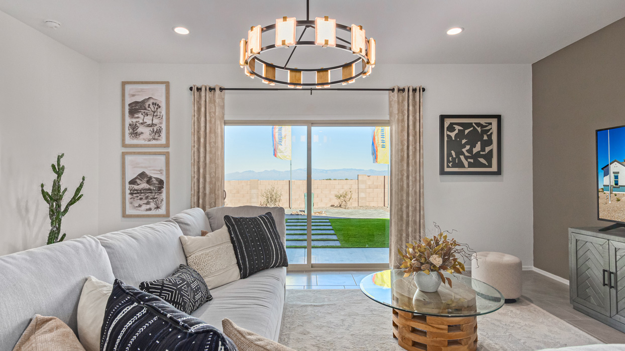 Welcome to the Kingston, a premier new home design situated in the picturesque Sycamore Vista community in Vail, Arizona. With an expansive 2,051 square feet of living space, this single-story home offers four bedrooms, two bathrooms, and a two-three car garage.  As you step inside, you are greeted by an inviting entryway that flows seamlessly into a heart of the home. The open-concept kitchen, equipped with a center island, modern appliances, and ample pantry space, makes it ideal for culinary adventures. Adjacent to the kitchen, the dining room offers easy access to the covered patio, where you can enjoy outdoor dining or simply relax in the tranquility of your private backyard.  The Kingston’s thoughtful layout ensures that every bedroom offers comfort and privacy. The primary suite, located at the rear of the home, features a large walk-in closet and an en-suite bathroom. The additional bedrooms are thoughtfully arranged to provide flexibility, whether you need a guest room, home office, or space for hobbies.  The Kingston is built with a focus on energy efficiency, featuring top-of-the-line insulation, energy-efficient appliances, and a smart home package that includes an automated thermostat, keyless entry, a Wi-Fi-enabled garage door opener, and more. This modern home not only offers comfort but also provides peace of mind with its energy-saving features and enhanced security systems.  Residents of Sycamore Vista enjoy a harmonious blend of rural tranquility and convenient urban access. With proximity to outdoor attractions like Coronado National Forest and Colossal Cave Mountain Park, as well as nearby schools and major employers, Sycamore Vista provides a unique living experience where nature and modern living coexist.  The Kingston at Sycamore Vista is more than just a house—it's a place to create lasting memories and live your best life.  *Images shown are for reference only. They depict the sales model home and may not represent the actual home.