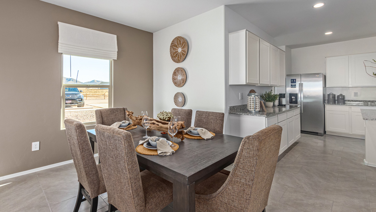 Welcome to the Kingston, a premier new home design situated in the picturesque Sycamore Vista community in Vail, Arizona. With an expansive 2,051 square feet of living space, this single-story home offers four bedrooms, two bathrooms, and a two-three car garage.  As you step inside, you are greeted by an inviting entryway that flows seamlessly into a heart of the home. The open-concept kitchen, equipped with a center island, modern appliances, and ample pantry space, makes it ideal for culinary adventures. Adjacent to the kitchen, the dining room offers easy access to the covered patio, where you can enjoy outdoor dining or simply relax in the tranquility of your private backyard.  The Kingston’s thoughtful layout ensures that every bedroom offers comfort and privacy. The primary suite, located at the rear of the home, features a large walk-in closet and an en-suite bathroom. The additional bedrooms are thoughtfully arranged to provide flexibility, whether you need a guest room, home office, or space for hobbies.  The Kingston is built with a focus on energy efficiency, featuring top-of-the-line insulation, energy-efficient appliances, and a smart home package that includes an automated thermostat, keyless entry, a Wi-Fi-enabled garage door opener, and more. This modern home not only offers comfort but also provides peace of mind with its energy-saving features and enhanced security systems.  Residents of Sycamore Vista enjoy a harmonious blend of rural tranquility and convenient urban access. With proximity to outdoor attractions like Coronado National Forest and Colossal Cave Mountain Park, as well as nearby schools and major employers, Sycamore Vista provides a unique living experience where nature and modern living coexist.  The Kingston at Sycamore Vista is more than just a house—it's a place to create lasting memories and live your best life.  *Images shown are for reference only. They depict the sales model home and may not represent the actual home.