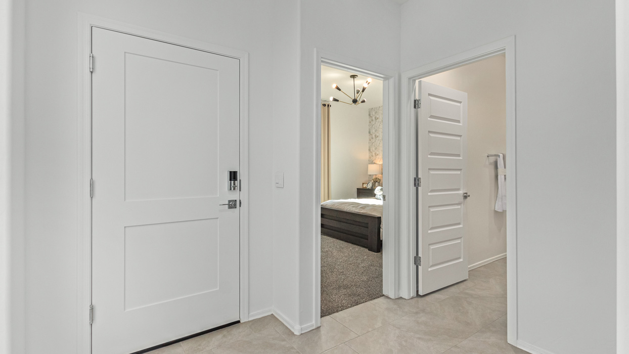 Welcome to the Kingston, a premier new home design situated in the picturesque Sycamore Vista community in Vail, Arizona. With an expansive 2,051 square feet of living space, this single-story home offers four bedrooms, two bathrooms, and a two-three car garage.  As you step inside, you are greeted by an inviting entryway that flows seamlessly into a heart of the home. The open-concept kitchen, equipped with a center island, modern appliances, and ample pantry space, makes it ideal for culinary adventures. Adjacent to the kitchen, the dining room offers easy access to the covered patio, where you can enjoy outdoor dining or simply relax in the tranquility of your private backyard.  The Kingston’s thoughtful layout ensures that every bedroom offers comfort and privacy. The primary suite, located at the rear of the home, features a large walk-in closet and an en-suite bathroom. The additional bedrooms are thoughtfully arranged to provide flexibility, whether you need a guest room, home office, or space for hobbies.  The Kingston is built with a focus on energy efficiency, featuring top-of-the-line insulation, energy-efficient appliances, and a smart home package that includes an automated thermostat, keyless entry, a Wi-Fi-enabled garage door opener, and more. This modern home not only offers comfort but also provides peace of mind with its energy-saving features and enhanced security systems.  Residents of Sycamore Vista enjoy a harmonious blend of rural tranquility and convenient urban access. With proximity to outdoor attractions like Coronado National Forest and Colossal Cave Mountain Park, as well as nearby schools and major employers, Sycamore Vista provides a unique living experience where nature and modern living coexist.  The Kingston at Sycamore Vista is more than just a house—it's a place to create lasting memories and live your best life.  *Images shown are for reference only. They depict the sales model home and may not represent the actual home.