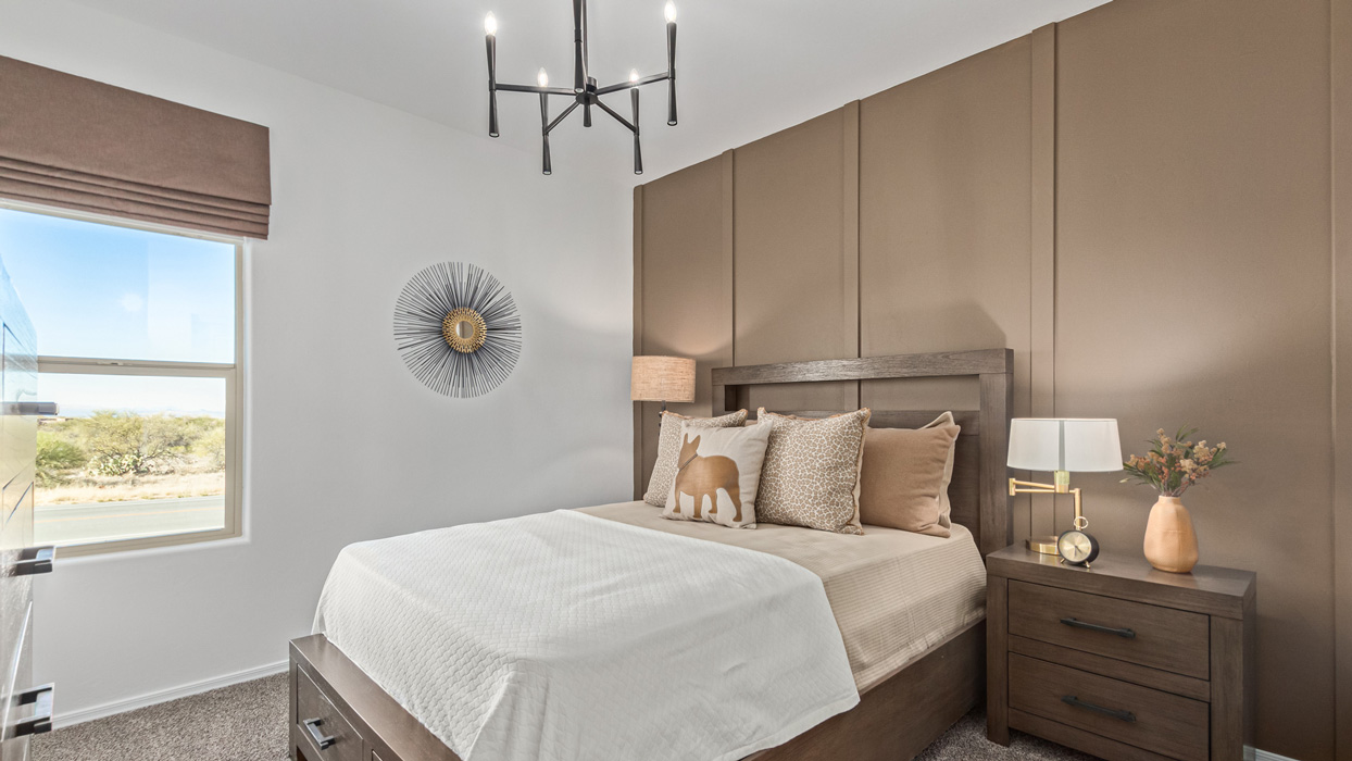 Welcome to the Kingston, a premier new home design situated in the picturesque Sycamore Vista community in Vail, Arizona. With an expansive 2,051 square feet of living space, this single-story home offers four bedrooms, two bathrooms, and a two-three car garage.  As you step inside, you are greeted by an inviting entryway that flows seamlessly into a heart of the home. The open-concept kitchen, equipped with a center island, modern appliances, and ample pantry space, makes it ideal for culinary adventures. Adjacent to the kitchen, the dining room offers easy access to the covered patio, where you can enjoy outdoor dining or simply relax in the tranquility of your private backyard.  The Kingston’s thoughtful layout ensures that every bedroom offers comfort and privacy. The primary suite, located at the rear of the home, features a large walk-in closet and an en-suite bathroom. The additional bedrooms are thoughtfully arranged to provide flexibility, whether you need a guest room, home office, or space for hobbies.  The Kingston is built with a focus on energy efficiency, featuring top-of-the-line insulation, energy-efficient appliances, and a smart home package that includes an automated thermostat, keyless entry, a Wi-Fi-enabled garage door opener, and more. This modern home not only offers comfort but also provides peace of mind with its energy-saving features and enhanced security systems.  Residents of Sycamore Vista enjoy a harmonious blend of rural tranquility and convenient urban access. With proximity to outdoor attractions like Coronado National Forest and Colossal Cave Mountain Park, as well as nearby schools and major employers, Sycamore Vista provides a unique living experience where nature and modern living coexist.  The Kingston at Sycamore Vista is more than just a house—it's a place to create lasting memories and live your best life.  *Images shown are for reference only. They depict the sales model home and may not represent the actual home.