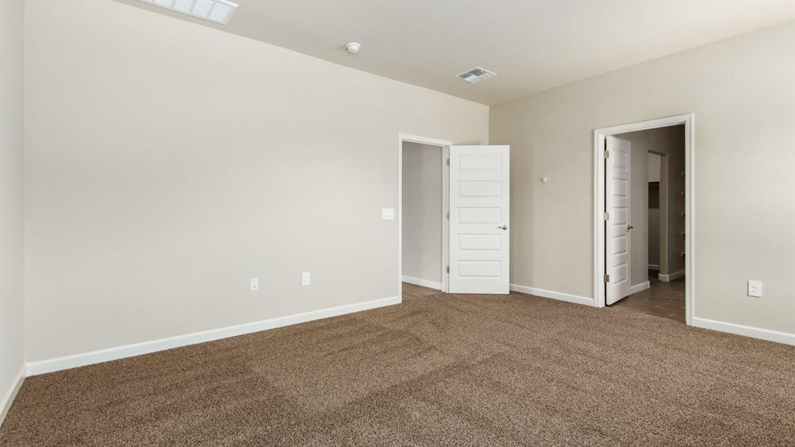 The Lakeway, situated within the beautiful Sycamore Vista community in Vail, Arizona, offers a perfect blend of functionality and comfort, ideal for both growing families and those who appreciate spacious living. With its 2,034 square feet of living space, this single-story new home features five bedrooms and three bathrooms, all meticulously designed to maximize space and convenience.  Entering The Lakeway, you’ll immediately notice the bright and airy atmosphere that flows through the open-concept floor plan. The heart of the home is the great room, seamlessly connected to the kitchen and dining area. The kitchen is equipped with quartz countertops, Shaker-style cabinetry, and a large island that serves as a focal point for both meal preparation and casual gatherings.  The primary bedroom is a true retreat, offering a spacious walk-in closet and an en-suite bathroom. The additional bedrooms are thoughtfully spaced to provide ample privacy for family members or guests, and the two secondary bathrooms are finished with modern fixtures and plenty of storage. This home offers a 2-3 car garage option for substantial space of vehicles and storage, accommodating the practical needs of busy households.  Standard features in The Lakeway at Sycamore Vista include energy-efficient elements like a tankless water heater, spray foam insulation, and LED lighting throughout. The home also comes with a Home is Connected® Smart Home package, which includes a smart thermostat, video doorbell, keyless entry, and more, ensuring modern conveniences are at your fingertips. The front yard is beautifully landscaped and includes an auto drip irrigation system, enhancing the curb appeal of this stunning home.  Nestled within Sycamore Vista, The Lakeway combines the tranquility of a rural setting with proximity to excellent schools, shopping, dining, and outdoor recreation, making it an exceptional place to call home.