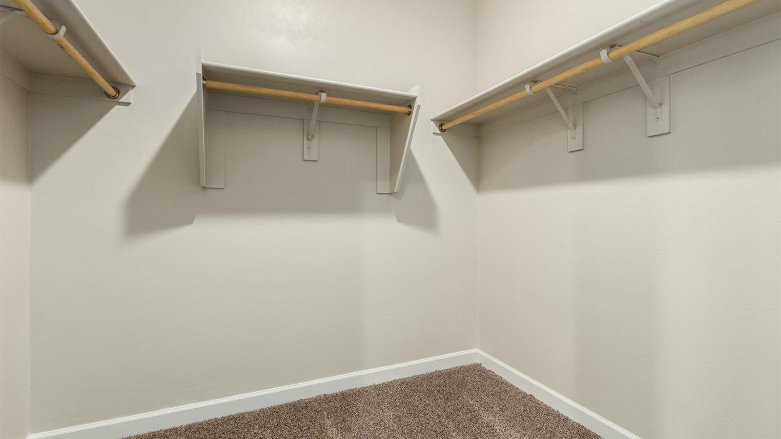 The Lakeway, situated within the beautiful Sycamore Vista community in Vail, Arizona, offers a perfect blend of functionality and comfort, ideal for both growing families and those who appreciate spacious living. With its 2,034 square feet of living space, this single-story new home features five bedrooms and three bathrooms, all meticulously designed to maximize space and convenience.  Entering The Lakeway, you’ll immediately notice the bright and airy atmosphere that flows through the open-concept floor plan. The heart of the home is the great room, seamlessly connected to the kitchen and dining area. The kitchen is equipped with quartz countertops, Shaker-style cabinetry, and a large island that serves as a focal point for both meal preparation and casual gatherings.  The primary bedroom is a true retreat, offering a spacious walk-in closet and an en-suite bathroom. The additional bedrooms are thoughtfully spaced to provide ample privacy for family members or guests, and the two secondary bathrooms are finished with modern fixtures and plenty of storage. This home offers a 2-3 car garage option for substantial space of vehicles and storage, accommodating the practical needs of busy households.  Standard features in The Lakeway at Sycamore Vista include energy-efficient elements like a tankless water heater, spray foam insulation, and LED lighting throughout. The home also comes with a Home is Connected® Smart Home package, which includes a smart thermostat, video doorbell, keyless entry, and more, ensuring modern conveniences are at your fingertips. The front yard is beautifully landscaped and includes an auto drip irrigation system, enhancing the curb appeal of this stunning home.  Nestled within Sycamore Vista, The Lakeway combines the tranquility of a rural setting with proximity to excellent schools, shopping, dining, and outdoor recreation, making it an exceptional place to call home.