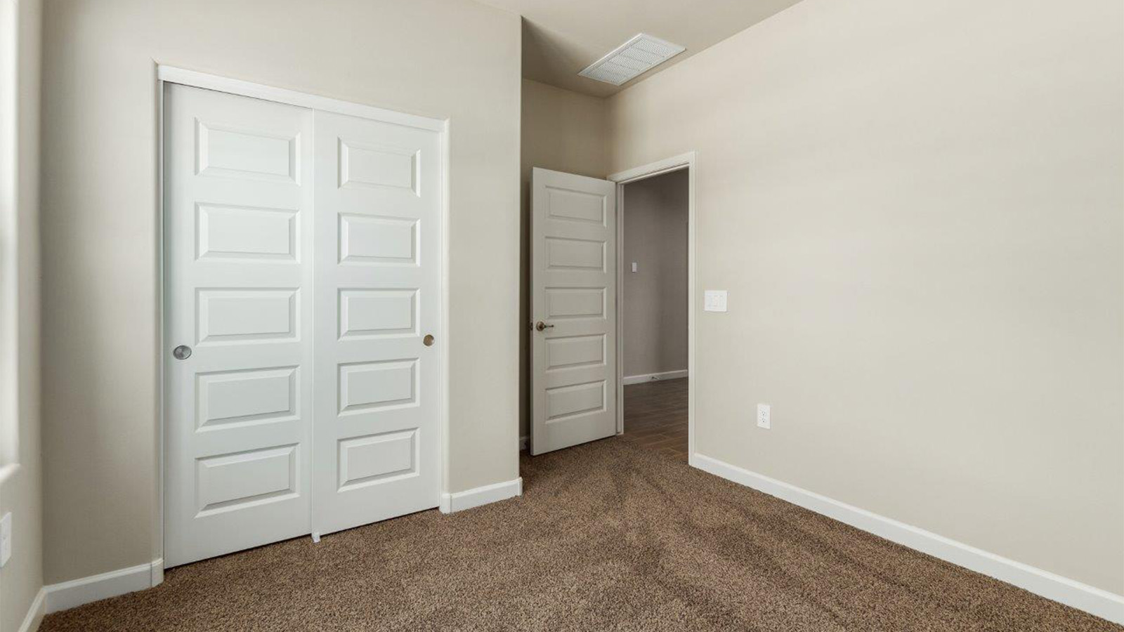 The Lakeway, situated within the beautiful Sycamore Vista community in Vail, Arizona, offers a perfect blend of functionality and comfort, ideal for both growing families and those who appreciate spacious living. With its 2,034 square feet of living space, this single-story new home features five bedrooms and three bathrooms, all meticulously designed to maximize space and convenience.  Entering The Lakeway, you’ll immediately notice the bright and airy atmosphere that flows through the open-concept floor plan. The heart of the home is the great room, seamlessly connected to the kitchen and dining area. The kitchen is equipped with quartz countertops, Shaker-style cabinetry, and a large island that serves as a focal point for both meal preparation and casual gatherings.  The primary bedroom is a true retreat, offering a spacious walk-in closet and an en-suite bathroom. The additional bedrooms are thoughtfully spaced to provide ample privacy for family members or guests, and the two secondary bathrooms are finished with modern fixtures and plenty of storage. This home offers a 2-3 car garage option for substantial space of vehicles and storage, accommodating the practical needs of busy households.  Standard features in The Lakeway at Sycamore Vista include energy-efficient elements like a tankless water heater, spray foam insulation, and LED lighting throughout. The home also comes with a Home is Connected® Smart Home package, which includes a smart thermostat, video doorbell, keyless entry, and more, ensuring modern conveniences are at your fingertips. The front yard is beautifully landscaped and includes an auto drip irrigation system, enhancing the curb appeal of this stunning home.  Nestled within Sycamore Vista, The Lakeway combines the tranquility of a rural setting with proximity to excellent schools, shopping, dining, and outdoor recreation, making it an exceptional place to call home.