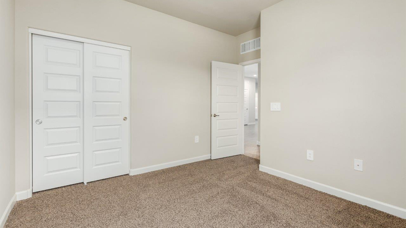 The Lakeway, situated within the beautiful Sycamore Vista community in Vail, Arizona, offers a perfect blend of functionality and comfort, ideal for both growing families and those who appreciate spacious living. With its 2,034 square feet of living space, this single-story new home features five bedrooms and three bathrooms, all meticulously designed to maximize space and convenience.  Entering The Lakeway, you’ll immediately notice the bright and airy atmosphere that flows through the open-concept floor plan. The heart of the home is the great room, seamlessly connected to the kitchen and dining area. The kitchen is equipped with quartz countertops, Shaker-style cabinetry, and a large island that serves as a focal point for both meal preparation and casual gatherings.  The primary bedroom is a true retreat, offering a spacious walk-in closet and an en-suite bathroom. The additional bedrooms are thoughtfully spaced to provide ample privacy for family members or guests, and the two secondary bathrooms are finished with modern fixtures and plenty of storage. This home offers a 2-3 car garage option for substantial space of vehicles and storage, accommodating the practical needs of busy households.  Standard features in The Lakeway at Sycamore Vista include energy-efficient elements like a tankless water heater, spray foam insulation, and LED lighting throughout. The home also comes with a Home is Connected® Smart Home package, which includes a smart thermostat, video doorbell, keyless entry, and more, ensuring modern conveniences are at your fingertips. The front yard is beautifully landscaped and includes an auto drip irrigation system, enhancing the curb appeal of this stunning home.  Nestled within Sycamore Vista, The Lakeway combines the tranquility of a rural setting with proximity to excellent schools, shopping, dining, and outdoor recreation, making it an exceptional place to call home.