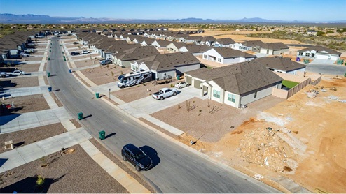 Welcome to Sycamore Vista, a serene new home community by D.R. Horton, nestled in the picturesque foothills of the Santa Rita Mountains. This new phase of Sycamore Vista offers seven thoughtfully designed, single-story floor plans, perfectly paired with breathtaking mountain views and stunning sunsets. Located in the highly sought-after Vail School District, Sycamore Vista is just around the corner from Corona Foothills Middle School, Sycamore Elementary School, and Copper Ridge Elementary School, making it an ideal choice for families. Each new home at Sycamore Vista is crafted with spacious living in mind, featuring large backyards, 3-car garage options, and wide spaces between neighbors, ensuring privacy and tranquility. The homes come with beautifully landscaped front yards equipped with auto drip irrigation systems and soft water loops, adding both convenience and beauty to your outdoor spaces. Enjoy easy access to your outdoor living area through the 6x8 ft backdoor sliders that lead to the back patio, perfect for entertaining or simply relaxing. Additionally, many homes offer double gate options to the backyard, providing extra convenience for accessing and utilizing your expansive yard. Inside, you'll find luxury finishes, including staggered wood-look ceramic tile flooring throughout most areas, granite countertops in the kitchens and bathrooms, and Shaker-style cabinets. The open, single basin stainless steel kitchen sinks, paired with water filtration systems, enhance the functionality and style of your kitchen. Energy efficiency is at the forefront of Sycamore Vista’s new homes. Each home is a DOE Zero Energy Ready Home, featuring spray foam insulation, tankless water heaters, and LED lighting throughout, ensuring lower energy costs and a smaller carbon footprint. The Home is Connected® Smart Home package includes a smart thermostat, video doorbell, keyless entry, and a wifi-enabled garage door opener and more, offering modern conveniences that simplify daily life. With its higher elevation, the community enjoys cooler summer temperatures and less light pollution, making it a perfect spot for stargazing. Outdoor enthusiasts will appreciate the proximity to local, state, and national parks, including Coronado National Forest, Colossal Cave Mountain Park, and Kartchner Caverns State Park, offering endless opportunities for hiking, biking, and camping. Sycamore Vista is ideally located for those who value both tranquility and convenience. This community is a peaceful retreat from the hustle and bustle of city life, yet still provides easy access to shopping, dining, and major employers like the Target Distribution Center and the Amazon Fulfillment Center. Sycamore Vista is just minutes away from major highways, providing easy access to Tucson’s vibrant city life while allowing you to return home to a peaceful, rural setting. Experience the best of Arizona living at Sycamore Vista, where quality craftsmanship, modern amenities, and the beauty of nature come together to create the perfect place to call home.