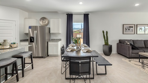 Welcome to Casas del Cerrito, an exclusive new home community by D.R. Horton, perfectly situated on Tucson’s highly sought-after east side. Designed for those who crave a blend of modern convenience, natural beauty, and top-notch education, this community offers the ideal setting for your next chapter. Nestled against the backdrop of breathtaking mountain views, Casas del Cerrito provides easy access to everything that makes Tucson a desirable place to live. Whether you’re heading to work or exploring the great outdoors, you’re never far from what you need. Enjoy quick access to major employers like Davis-Monthan Air Force Base, Raytheon, and Pima Community College East Campus, ensuring your commute is a breeze. Families will appreciate the proximity to exceptional schools, including the esteemed Leman Academy of Excellence and Legacy Traditional School, both located within a mile of the community. With these top-tier schools just around the corner, you can rest assured your children will receive an exceptional education. Outdoor enthusiasts will love being just minutes from Saguaro National Park East, where you can explore miles of hiking and biking trails, admire the majestic saguaro cacti, and take in the stunning desert landscapes. Casas del Cerrito is also close to Lincoln Park, Agua Caliente Regional Park, Mount Lemmon, Reddington Pass, Tanque Verde Falls, multiple Dog Parks, and so much more! Casas del Cerrito is more than just a place to live—it’s a place to thrive. Our homes range from 3 to 5 bedrooms and feature modern, energy-efficient designs that meet the DOE Zero Energy Ready Home standards. Each home is equipped with our signature Home Is Connected Smart Home Package, giving you control and peace of mind. Standard features include elegant granite countertops in kitchens and bathrooms, 18”x18” tile flooring throughout all areas except bedrooms, and spacious walk-in closets in the primary suites. The homes also offer larger lots, pool-ready and perfect for your backyard dreams. The Spanish lace stucco exteriors, tile roofs, and professionally landscaped front yards with auto-drip irrigation add to the curb appeal. For those who enjoy recreational activities, Casas del Cerrito is surrounded by a plethora of options. Tee off at Fred Enke Golf Course, ride the trails at nearby mountain bike parks, or enjoy a day at one of the many stables like Raven Ranch and Sonoran Stables. When it’s time to relax, visit nearby attractions like Trail Dust Town, Park Place Mall, or catch a movie at Galaxy Theatres. Casas del Cerrito offers a unique blend of urban convenience and natural serenity, making it the perfect place to call home. Join this vibrant community and start living the lifestyle you’ve always dreamed of.