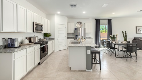 Welcome to Casas del Cerrito, an exclusive new home community by D.R. Horton, perfectly situated on Tucson’s highly sought-after east side. Designed for those who crave a blend of modern convenience, natural beauty, and top-notch education, this community offers the ideal setting for your next chapter. Nestled against the backdrop of breathtaking mountain views, Casas del Cerrito provides easy access to everything that makes Tucson a desirable place to live. Whether you’re heading to work or exploring the great outdoors, you’re never far from what you need. Enjoy quick access to major employers like Davis-Monthan Air Force Base, Raytheon, and Pima Community College East Campus, ensuring your commute is a breeze. Families will appreciate the proximity to exceptional schools, including the esteemed Leman Academy of Excellence and Legacy Traditional School, both located within a mile of the community. With these top-tier schools just around the corner, you can rest assured your children will receive an exceptional education. Outdoor enthusiasts will love being just minutes from Saguaro National Park East, where you can explore miles of hiking and biking trails, admire the majestic saguaro cacti, and take in the stunning desert landscapes. Casas del Cerrito is also close to Lincoln Park, Agua Caliente Regional Park, Mount Lemmon, Reddington Pass, Tanque Verde Falls, multiple Dog Parks, and so much more! Casas del Cerrito is more than just a place to live—it’s a place to thrive. Our homes range from 3 to 5 bedrooms and feature modern, energy-efficient designs that meet the DOE Zero Energy Ready Home standards. Each home is equipped with our signature Home Is Connected Smart Home Package, giving you control and peace of mind. Standard features include elegant granite countertops in kitchens and bathrooms, 18”x18” tile flooring throughout all areas except bedrooms, and spacious walk-in closets in the primary suites. The homes also offer larger lots, pool-ready and perfect for your backyard dreams. The Spanish lace stucco exteriors, tile roofs, and professionally landscaped front yards with auto-drip irrigation add to the curb appeal. For those who enjoy recreational activities, Casas del Cerrito is surrounded by a plethora of options. Tee off at Fred Enke Golf Course, ride the trails at nearby mountain bike parks, or enjoy a day at one of the many stables like Raven Ranch and Sonoran Stables. When it’s time to relax, visit nearby attractions like Trail Dust Town, Park Place Mall, or catch a movie at Galaxy Theatres. Casas del Cerrito offers a unique blend of urban convenience and natural serenity, making it the perfect place to call home. Join this vibrant community and start living the lifestyle you’ve always dreamed of.