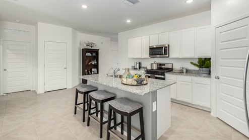Welcome to Casas del Cerrito, an exclusive new home community by D.R. Horton, perfectly situated on Tucson’s highly sought-after east side. Designed for those who crave a blend of modern convenience, natural beauty, and top-notch education, this community offers the ideal setting for your next chapter. Nestled against the backdrop of breathtaking mountain views, Casas del Cerrito provides easy access to everything that makes Tucson a desirable place to live. Whether you’re heading to work or exploring the great outdoors, you’re never far from what you need. Enjoy quick access to major employers like Davis-Monthan Air Force Base, Raytheon, and Pima Community College East Campus, ensuring your commute is a breeze. Families will appreciate the proximity to exceptional schools, including the esteemed Leman Academy of Excellence and Legacy Traditional School, both located within a mile of the community. With these top-tier schools just around the corner, you can rest assured your children will receive an exceptional education. Outdoor enthusiasts will love being just minutes from Saguaro National Park East, where you can explore miles of hiking and biking trails, admire the majestic saguaro cacti, and take in the stunning desert landscapes. Casas del Cerrito is also close to Lincoln Park, Agua Caliente Regional Park, Mount Lemmon, Reddington Pass, Tanque Verde Falls, multiple Dog Parks, and so much more! Casas del Cerrito is more than just a place to live—it’s a place to thrive. Our homes range from 3 to 5 bedrooms and feature modern, energy-efficient designs that meet the DOE Zero Energy Ready Home standards. Each home is equipped with our signature Home Is Connected Smart Home Package, giving you control and peace of mind. Standard features include elegant granite countertops in kitchens and bathrooms, 18”x18” tile flooring throughout all areas except bedrooms, and spacious walk-in closets in the primary suites. The homes also offer larger lots, pool-ready and perfect for your backyard dreams. The Spanish lace stucco exteriors, tile roofs, and professionally landscaped front yards with auto-drip irrigation add to the curb appeal. For those who enjoy recreational activities, Casas del Cerrito is surrounded by a plethora of options. Tee off at Fred Enke Golf Course, ride the trails at nearby mountain bike parks, or enjoy a day at one of the many stables like Raven Ranch and Sonoran Stables. When it’s time to relax, visit nearby attractions like Trail Dust Town, Park Place Mall, or catch a movie at Galaxy Theatres. Casas del Cerrito offers a unique blend of urban convenience and natural serenity, making it the perfect place to call home. Join this vibrant community and start living the lifestyle you’ve always dreamed of.