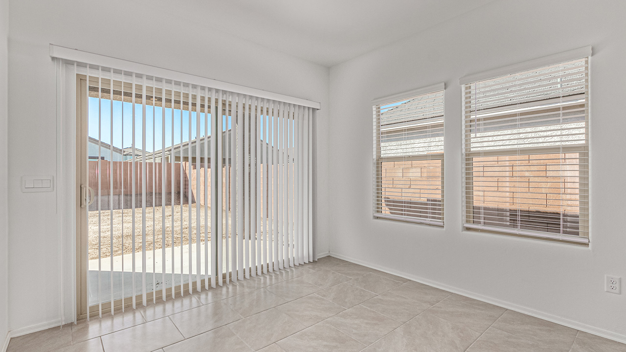 Step into The Baxter at Casas del Cerrito in Tucson, Arizona – a beautifully designed 1,423 sq. ft. single-story new home that perfectly blends modern convenience with the serene beauty of the surrounding desert landscape.  As you enter through the welcoming front porch, you’re greeted by a thoughtfully planned entryway that leads into the heart of the home – a spacious and open-concept great room. This central living area flows seamlessly into the dining space, creating an ideal environment for both entertaining and everyday family life.  The gourmet kitchen, situated adjacent to the dining room, features elegant granite countertops, a large island with a breakfast bar, modern appliances, and a walk-in pantry, providing ample storage and a perfect space for culinary creativity.  The master suite, located at the rear of the home for added privacy, offers a generous walk-in closet and a luxurious en-suite bathroom with dual vanities and a walk-in shower. Large windows allow plenty of natural light to fill the space, creating a tranquil retreat.  Two additional bedrooms are positioned near the front of the home, each with easy access to a full bathroom. These rooms are perfect for family members, guests, or a home office, offering flexibility to suit your lifestyle.  For added convenience, the home includes a utility room and a two-car garage, ensuring that daily routines are efficient and organized.  Step outside to the covered patio, where you can relax and enjoy the stunning mountain views and Tucson’s beautiful weather year-round. Whether you’re hosting a weekend barbecue or enjoying a quiet evening outdoors, this space extends your living area into the peaceful surroundings of Casas del Cerrito.  Designed with energy efficiency in mind, The Baxter at Casas del Cerrito is a DOE Zero Energy Ready Home, ensuring long-term savings and a sustainable living environment.