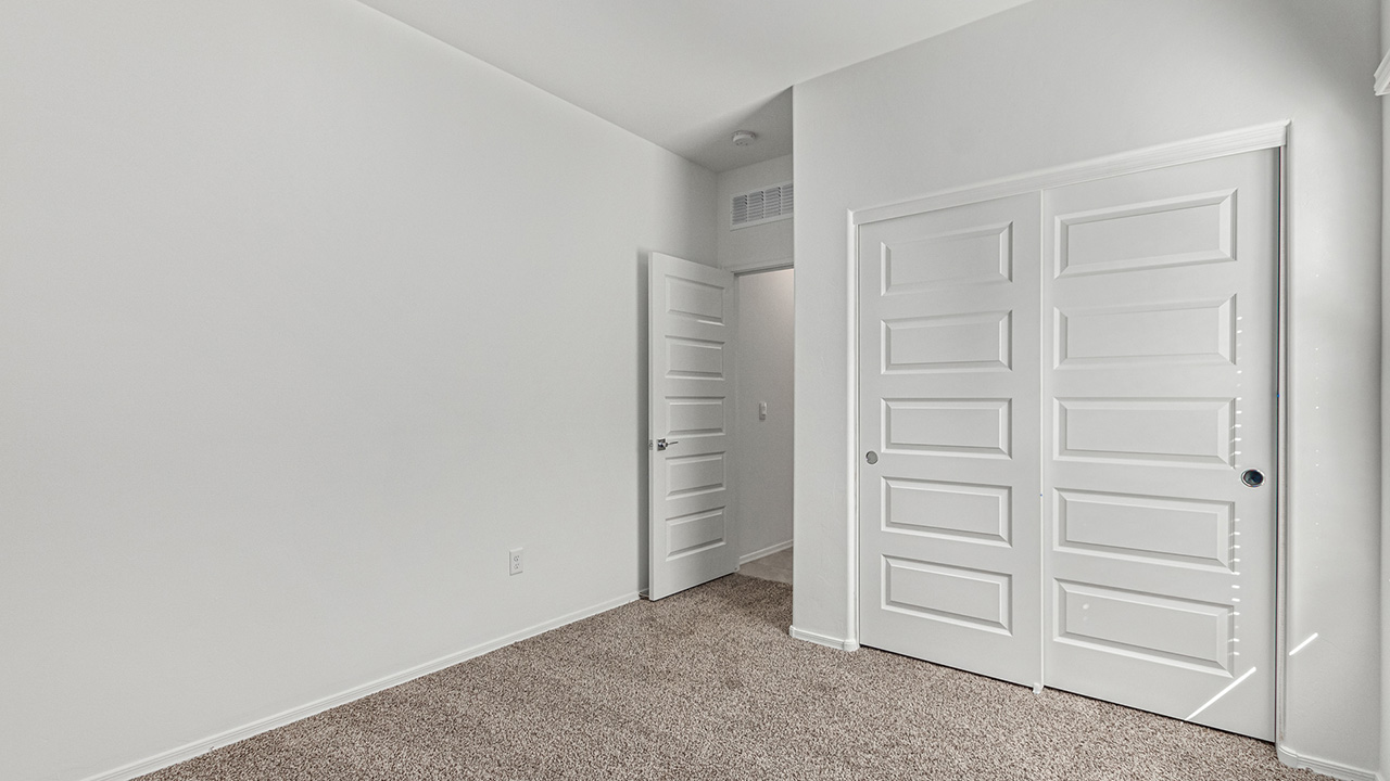 Step into The Baxter at Casas del Cerrito in Tucson, Arizona – a beautifully designed 1,423 sq. ft. single-story new home that perfectly blends modern convenience with the serene beauty of the surrounding desert landscape.  As you enter through the welcoming front porch, you’re greeted by a thoughtfully planned entryway that leads into the heart of the home – a spacious and open-concept great room. This central living area flows seamlessly into the dining space, creating an ideal environment for both entertaining and everyday family life.  The gourmet kitchen, situated adjacent to the dining room, features elegant granite countertops, a large island with a breakfast bar, modern appliances, and a walk-in pantry, providing ample storage and a perfect space for culinary creativity.  The master suite, located at the rear of the home for added privacy, offers a generous walk-in closet and a luxurious en-suite bathroom with dual vanities and a walk-in shower. Large windows allow plenty of natural light to fill the space, creating a tranquil retreat.  Two additional bedrooms are positioned near the front of the home, each with easy access to a full bathroom. These rooms are perfect for family members, guests, or a home office, offering flexibility to suit your lifestyle.  For added convenience, the home includes a utility room and a two-car garage, ensuring that daily routines are efficient and organized.  Step outside to the covered patio, where you can relax and enjoy the stunning mountain views and Tucson’s beautiful weather year-round. Whether you’re hosting a weekend barbecue or enjoying a quiet evening outdoors, this space extends your living area into the peaceful surroundings of Casas del Cerrito.  Designed with energy efficiency in mind, The Baxter at Casas del Cerrito is a DOE Zero Energy Ready Home, ensuring long-term savings and a sustainable living environment.