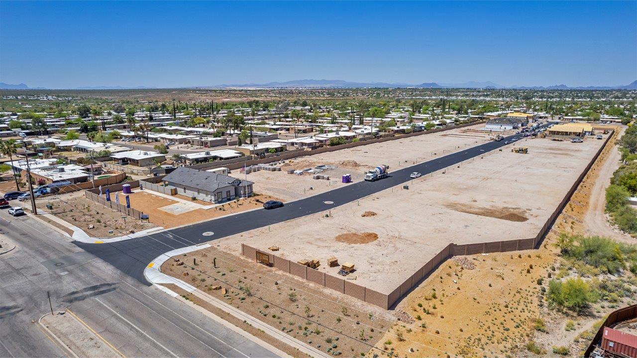 Step into The Baxter at Casas del Cerrito in Tucson, Arizona – a beautifully designed 1,423 sq. ft. single-story new home that perfectly blends modern convenience with the serene beauty of the surrounding desert landscape.  As you enter through the welcoming front porch, you’re greeted by a thoughtfully planned entryway that leads into the heart of the home – a spacious and open-concept great room. This central living area flows seamlessly into the dining space, creating an ideal environment for both entertaining and everyday family life.  The gourmet kitchen, situated adjacent to the dining room, features elegant granite countertops, a large island with a breakfast bar, modern appliances, and a walk-in pantry, providing ample storage and a perfect space for culinary creativity.  The master suite, located at the rear of the home for added privacy, offers a generous walk-in closet and a luxurious en-suite bathroom with dual vanities and a walk-in shower. Large windows allow plenty of natural light to fill the space, creating a tranquil retreat.  Two additional bedrooms are positioned near the front of the home, each with easy access to a full bathroom. These rooms are perfect for family members, guests, or a home office, offering flexibility to suit your lifestyle.  For added convenience, the home includes a utility room and a two-car garage, ensuring that daily routines are efficient and organized.  Step outside to the covered patio, where you can relax and enjoy the stunning mountain views and Tucson’s beautiful weather year-round. Whether you’re hosting a weekend barbecue or enjoying a quiet evening outdoors, this space extends your living area into the peaceful surroundings of Casas del Cerrito.  Designed with energy efficiency in mind, The Baxter at Casas del Cerrito is a DOE Zero Energy Ready Home, ensuring long-term savings and a sustainable living environment.