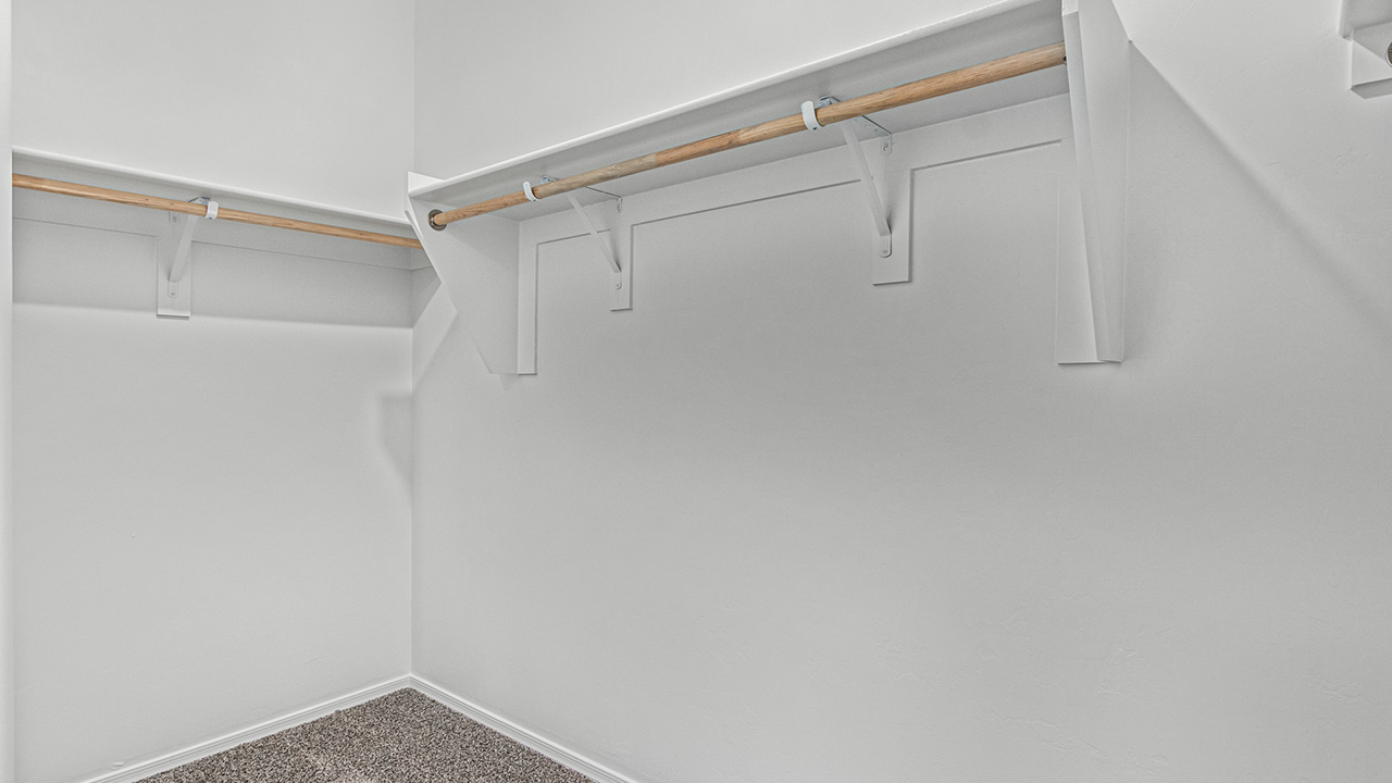 Step into The Baxter at Casas del Cerrito in Tucson, Arizona – a beautifully designed 1,423 sq. ft. single-story new home that perfectly blends modern convenience with the serene beauty of the surrounding desert landscape.  As you enter through the welcoming front porch, you’re greeted by a thoughtfully planned entryway that leads into the heart of the home – a spacious and open-concept great room. This central living area flows seamlessly into the dining space, creating an ideal environment for both entertaining and everyday family life.  The gourmet kitchen, situated adjacent to the dining room, features elegant granite countertops, a large island with a breakfast bar, modern appliances, and a walk-in pantry, providing ample storage and a perfect space for culinary creativity.  The master suite, located at the rear of the home for added privacy, offers a generous walk-in closet and a luxurious en-suite bathroom with dual vanities and a walk-in shower. Large windows allow plenty of natural light to fill the space, creating a tranquil retreat.  Two additional bedrooms are positioned near the front of the home, each with easy access to a full bathroom. These rooms are perfect for family members, guests, or a home office, offering flexibility to suit your lifestyle.  For added convenience, the home includes a utility room and a two-car garage, ensuring that daily routines are efficient and organized.  Step outside to the covered patio, where you can relax and enjoy the stunning mountain views and Tucson’s beautiful weather year-round. Whether you’re hosting a weekend barbecue or enjoying a quiet evening outdoors, this space extends your living area into the peaceful surroundings of Casas del Cerrito.  Designed with energy efficiency in mind, The Baxter at Casas del Cerrito is a DOE Zero Energy Ready Home, ensuring long-term savings and a sustainable living environment.