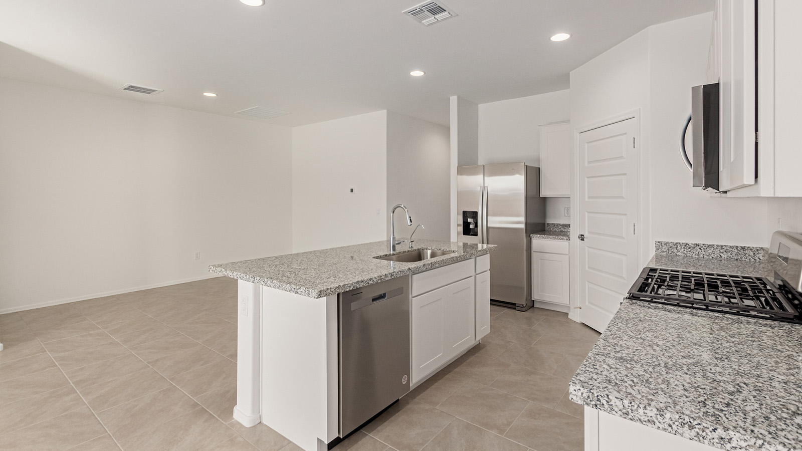 Welcome to The Easton at Casas del Cerrito in Tucson, Arizona – a spacious 1,701 sq. ft. single-story new home that offers a perfect blend of modern convenience and serene desert living.  As you enter through the charming front porch, you’re greeted by a thoughtfully designed entryway that opens up into an expansive great room. This central living area seamlessly connects to the dining room and kitchen, creating an open-concept space that is perfect for entertaining and daily family life.  The kitchen is both stylish and functional, featuring elegant granite countertops, a large island with a breakfast bar, modern appliances, and a walk-in pantry that provides ample storage space. The flow from the kitchen to the dining area and great room ensures that everyone stays connected, whether you’re preparing meals, dining, or relaxing.  Step outside to the covered patio, where you can enjoy Tucson’s breathtaking mountain views and beautiful weather year-round. Whether you’re hosting a party or simply unwinding after a long day, this outdoor space extends your living area into the tranquil surroundings of Casas del Cerrito.  The master suite, located at the back of the home, offers a private retreat with a spacious bedroom, a large walk-in closet, and an en-suite bathroom complete with dual vanities and a walk-in shower. This peaceful sanctuary is designed for comfort and relaxation.  The Easton also includes three additional bedrooms, each offering plenty of space and natural light. These rooms are conveniently located near the second full bathroom, making it easy to accommodate family members and guests alike. For added convenience, the home features a utility room and direct access to a two-car garage, ensuring that daily routines are smooth and efficient.  Designed with energy efficiency in mind, The Easton at Casas del Cerrito is a DOE Zero Energy Ready Home, offering sustainability, comfort, and long-term savings.Welcome to The Easton at Casas del Cerrito in Tucson, Arizona – a spacious 1,701 sq. ft. single-story new home that offers a perfect blend of modern convenience and serene desert living.  As you enter through the charming front porch, you’re greeted by a thoughtfully designed entryway that opens up into an expansive great room. This central living area seamlessly connects to the dining room and kitchen, creating an open-concept space that is perfect for entertaining and daily family life.  The kitchen is both stylish and functional, featuring elegant granite countertops, a large island with a breakfast bar, modern appliances, and a walk-in pantry that provides ample storage space. The flow from the kitchen to the dining area and great room ensures that everyone stays connected, whether you’re preparing meals, dining, or relaxing.  Step outside to the covered patio, where you can enjoy Tucson’s breathtaking mountain views and beautiful weather year-round. Whether you’re hosting a party or simply unwinding after a long day, this outdoor space extends your living area into the tranquil surroundings of Casas del Cerrito.  The master suite, located at the back of the home, offers a private retreat with a spacious bedroom, a large walk-in closet, and an en-suite bathroom complete with dual vanities and a walk-in shower. This peaceful sanctuary is designed for comfort and relaxation.  The Easton also includes three additional bedrooms, each offering plenty of space and natural light. These rooms are conveniently located near the second full bathroom, making it easy to accommodate family members and guests alike. For added convenience, the home features a utility room and direct access to a two-car garage, ensuring that daily routines are smooth and efficient.  Designed with energy efficiency in mind, The Easton at Casas del Cerrito is a DOE Zero Energy Ready Home, offering sustainability, comfort, and long-term savings.