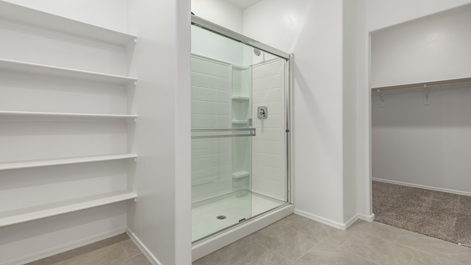 Welcome to The Easton at Casas del Cerrito in Tucson, Arizona – a spacious 1,701 sq. ft. single-story new home that offers a perfect blend of modern convenience and serene desert living.  As you enter through the charming front porch, you’re greeted by a thoughtfully designed entryway that opens up into an expansive great room. This central living area seamlessly connects to the dining room and kitchen, creating an open-concept space that is perfect for entertaining and daily family life.  The kitchen is both stylish and functional, featuring elegant granite countertops, a large island with a breakfast bar, modern appliances, and a walk-in pantry that provides ample storage space. The flow from the kitchen to the dining area and great room ensures that everyone stays connected, whether you’re preparing meals, dining, or relaxing.  Step outside to the covered patio, where you can enjoy Tucson’s breathtaking mountain views and beautiful weather year-round. Whether you’re hosting a party or simply unwinding after a long day, this outdoor space extends your living area into the tranquil surroundings of Casas del Cerrito.  The master suite, located at the back of the home, offers a private retreat with a spacious bedroom, a large walk-in closet, and an en-suite bathroom complete with dual vanities and a walk-in shower. This peaceful sanctuary is designed for comfort and relaxation.  The Easton also includes three additional bedrooms, each offering plenty of space and natural light. These rooms are conveniently located near the second full bathroom, making it easy to accommodate family members and guests alike. For added convenience, the home features a utility room and direct access to a two-car garage, ensuring that daily routines are smooth and efficient.  Designed with energy efficiency in mind, The Easton at Casas del Cerrito is a DOE Zero Energy Ready Home, offering sustainability, comfort, and long-term savings.