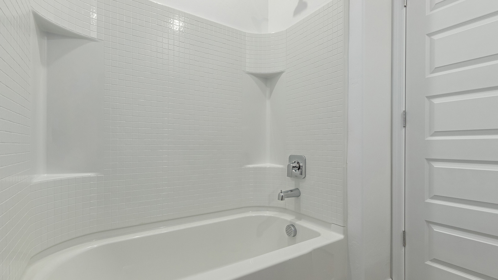 Welcome to The Easton at Casas del Cerrito in Tucson, Arizona – a spacious 1,701 sq. ft. single-story new home that offers a perfect blend of modern convenience and serene desert living.  As you enter through the charming front porch, you’re greeted by a thoughtfully designed entryway that opens up into an expansive great room. This central living area seamlessly connects to the dining room and kitchen, creating an open-concept space that is perfect for entertaining and daily family life.  The kitchen is both stylish and functional, featuring elegant granite countertops, a large island with a breakfast bar, modern appliances, and a walk-in pantry that provides ample storage space. The flow from the kitchen to the dining area and great room ensures that everyone stays connected, whether you’re preparing meals, dining, or relaxing.  Step outside to the covered patio, where you can enjoy Tucson’s breathtaking mountain views and beautiful weather year-round. Whether you’re hosting a party or simply unwinding after a long day, this outdoor space extends your living area into the tranquil surroundings of Casas del Cerrito.  The master suite, located at the back of the home, offers a private retreat with a spacious bedroom, a large walk-in closet, and an en-suite bathroom complete with dual vanities and a walk-in shower. This peaceful sanctuary is designed for comfort and relaxation.  The Easton also includes three additional bedrooms, each offering plenty of space and natural light. These rooms are conveniently located near the second full bathroom, making it easy to accommodate family members and guests alike. For added convenience, the home features a utility room and direct access to a two-car garage, ensuring that daily routines are smooth and efficient.  Designed with energy efficiency in mind, The Easton at Casas del Cerrito is a DOE Zero Energy Ready Home, offering sustainability, comfort, and long-term savings.