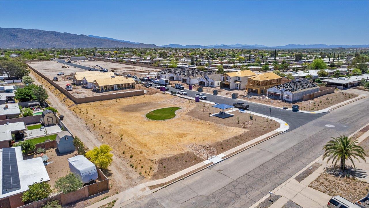 Welcome to The Easton at Casas del Cerrito in Tucson, Arizona – a spacious 1,701 sq. ft. single-story new home that offers a perfect blend of modern convenience and serene desert living.  As you enter through the charming front porch, you’re greeted by a thoughtfully designed entryway that opens up into an expansive great room. This central living area seamlessly connects to the dining room and kitchen, creating an open-concept space that is perfect for entertaining and daily family life.  The kitchen is both stylish and functional, featuring elegant granite countertops, a large island with a breakfast bar, modern appliances, and a walk-in pantry that provides ample storage space. The flow from the kitchen to the dining area and great room ensures that everyone stays connected, whether you’re preparing meals, dining, or relaxing.  Step outside to the covered patio, where you can enjoy Tucson’s breathtaking mountain views and beautiful weather year-round. Whether you’re hosting a party or simply unwinding after a long day, this outdoor space extends your living area into the tranquil surroundings of Casas del Cerrito.  The master suite, located at the back of the home, offers a private retreat with a spacious bedroom, a large walk-in closet, and an en-suite bathroom complete with dual vanities and a walk-in shower. This peaceful sanctuary is designed for comfort and relaxation.  The Easton also includes three additional bedrooms, each offering plenty of space and natural light. These rooms are conveniently located near the second full bathroom, making it easy to accommodate family members and guests alike. For added convenience, the home features a utility room and direct access to a two-car garage, ensuring that daily routines are smooth and efficient.  Designed with energy efficiency in mind, The Easton at Casas del Cerrito is a DOE Zero Energy Ready Home, offering sustainability, comfort, and long-term savings.