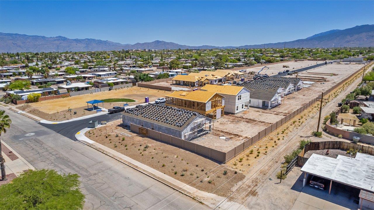 Welcome to The Easton at Casas del Cerrito in Tucson, Arizona – a spacious 1,701 sq. ft. single-story new home that offers a perfect blend of modern convenience and serene desert living.  As you enter through the charming front porch, you’re greeted by a thoughtfully designed entryway that opens up into an expansive great room. This central living area seamlessly connects to the dining room and kitchen, creating an open-concept space that is perfect for entertaining and daily family life.  The kitchen is both stylish and functional, featuring elegant granite countertops, a large island with a breakfast bar, modern appliances, and a walk-in pantry that provides ample storage space. The flow from the kitchen to the dining area and great room ensures that everyone stays connected, whether you’re preparing meals, dining, or relaxing.  Step outside to the covered patio, where you can enjoy Tucson’s breathtaking mountain views and beautiful weather year-round. Whether you’re hosting a party or simply unwinding after a long day, this outdoor space extends your living area into the tranquil surroundings of Casas del Cerrito.  The master suite, located at the back of the home, offers a private retreat with a spacious bedroom, a large walk-in closet, and an en-suite bathroom complete with dual vanities and a walk-in shower. This peaceful sanctuary is designed for comfort and relaxation.  The Easton also includes three additional bedrooms, each offering plenty of space and natural light. These rooms are conveniently located near the second full bathroom, making it easy to accommodate family members and guests alike. For added convenience, the home features a utility room and direct access to a two-car garage, ensuring that daily routines are smooth and efficient.  Designed with energy efficiency in mind, The Easton at Casas del Cerrito is a DOE Zero Energy Ready Home, offering sustainability, comfort, and long-term savings.