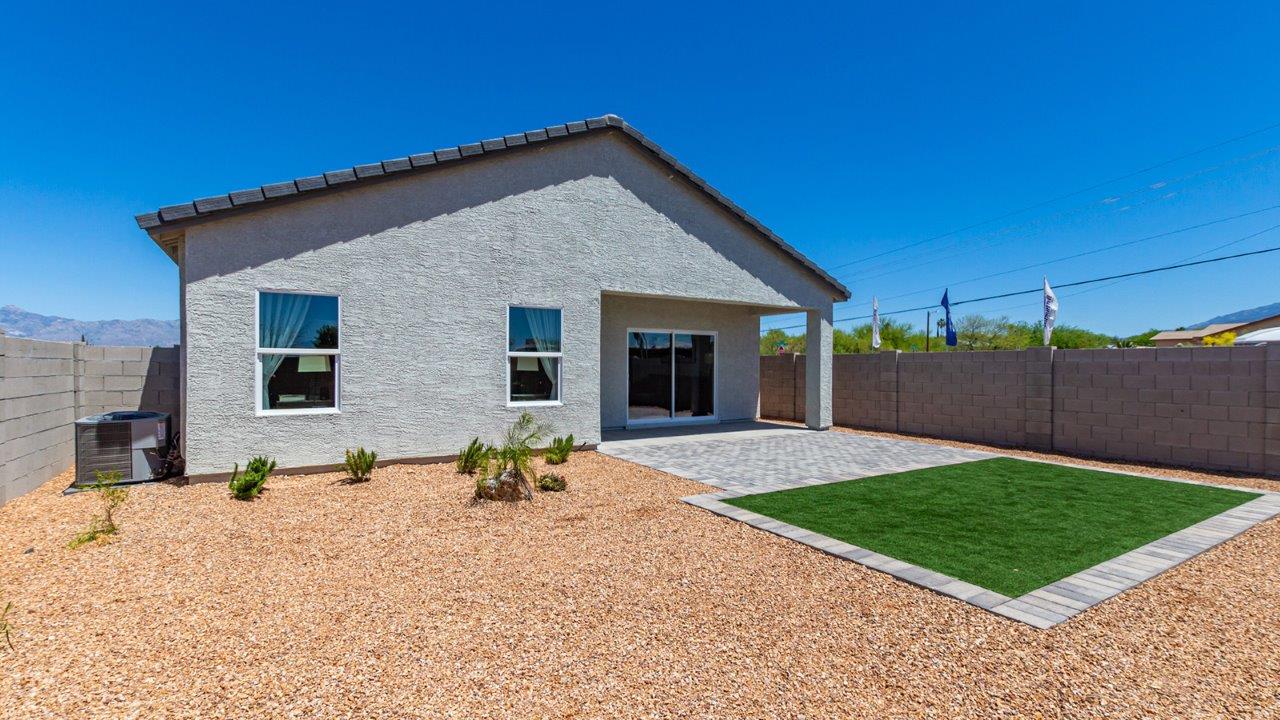 Welcome to The Gaven at Casas del Cerrito in Tucson, Arizona – a spacious 1,815 sq. ft. single-story new home that combines modern living with the beauty of the surrounding desert landscape.  As you step through the welcoming front porch, the entryway guides you into a generous great room. This open and inviting space is perfect for gatherings, effortlessly flowing into the dining area and kitchen, making it ideal for both daily living and entertaining.  The kitchen serves as the centerpiece of the home, boasting polished quartz countertops, a sizable island with a breakfast bar, modern appliances, and a pantry that provides ample storage for all your culinary needs. The layout ensures that the kitchen, dining area, and great room are interconnected, fostering a sense of togetherness.  Step outside to the covered patio, where you can take in the views and stunning finished backyard and enjoy Tucson’s warm climate. Whether you’re planning an outdoor meal or simply enjoying the fresh air, this space extends your living area and enhances your outdoor experience.  At the rear of the home, you'll find the primary suite – your private sanctuary. The primary bedroom offers a spacious setting, complemented by a large walk-in closet and an en-suite bathroom featuring dual vanities and a walk-in shower, creating a space where comfort meets practicality.  The Gaven also includes three additional bedrooms, each designed with plenty of space and natural light. These rooms are conveniently located near a second full bathroom, making it easy to accommodate family members and guests.  To enhance everyday living, the home includes a utility room and direct access to a two-car garage, designed to make household tasks more manageable.  Designed with energy efficiency in mind, The Gaven at Casas del Cerrito is a DOE Zero Energy Ready Home, offering sustainability, comfort, and long-term savings.  *Images shown are for reference only. They depict the Gaven Model home and may not represent the actual home.