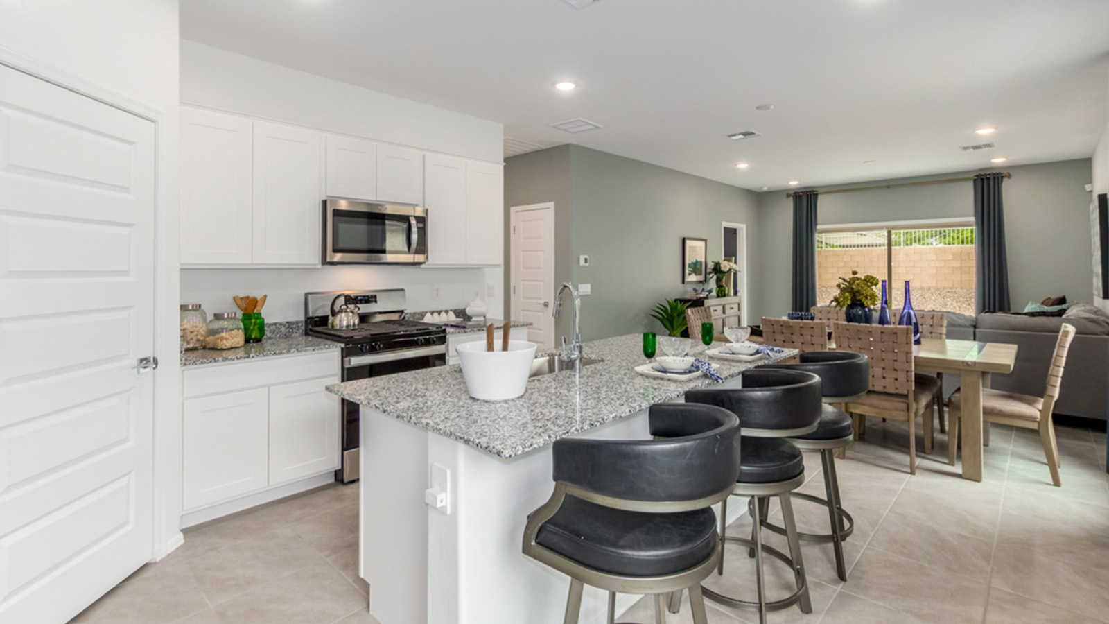 Welcome to the Amber floor plan, a beautifully designed single-story new home featuring three bedrooms and two bathrooms located in the vibrant Senita Crossing community. Spanning 1,331 square feet, this home is the perfect balance of style and comfort in a modern layout.  As you enter through the front porch, you step into an open-concept floor plan that immediately draws you into the heart of the home. The spacious great room seamlessly connects to the dining area and kitchen area. The kitchen features a central island, quartz countertops, and Shaker-style cabinetry.  The primary bedroom is thoughtfully positioned at the rear of the home, offering privacy and comfort. The primary suite features a large walk-in closet and an en-suite bathroom. The additional two bedrooms are located toward the front of the home, sharing a full bathroom, making this layout perfect for families or guests.  One of the standout features of The Amber is its outdoor living space. The covered patio extends from the great room, providing a perfect spot to enjoy Tucson’s beautiful weather year-round.  Senita Crossing is a community where convenience meets comfort. With its location on Tucson’s thriving southeast side, residents of this community enjoy easy access to I-10, Davis-Monthan Air Force Base, and major employers like Raytheon.  Energy efficiency is at the core of The Amber’s design, with features like tankless water heaters, LED lighting, and advanced spray foam insulation, all contributing to lower energy costs and a smaller carbon footprint.  The Amber at Senita Crossing isn’t just a home; it’s a lifestyle designed to meet the needs of today’s busy families. Experience all that this vibrant community has to offer and make The Amber your new home today.  *Images shown are for reference only. They depict the sales model home and may not represent the actual home.