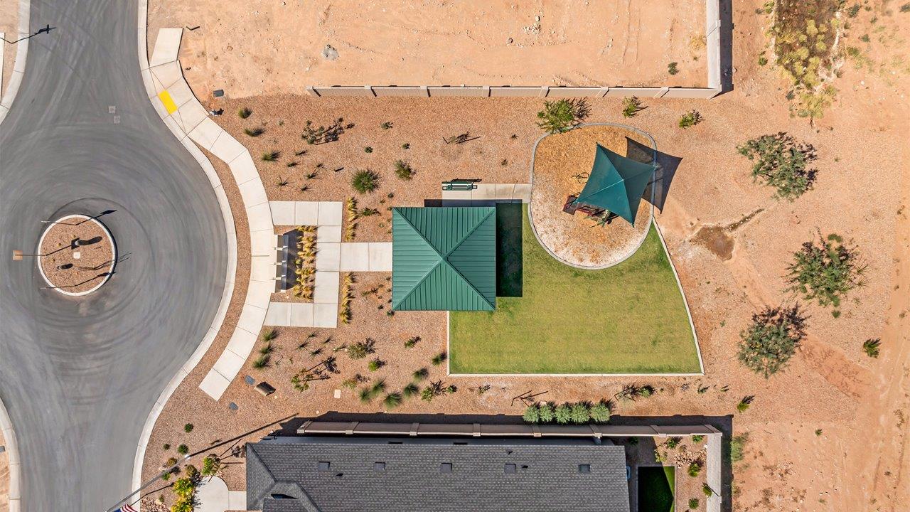 Step into The Grace, a charming two-story new home in the welcoming Senita Crossing community, designed for modern living with a blend of style and practicality. With 1,963 square feet, this home offers four bedrooms, two and a half bathrooms, and ample space for both family life and entertaining.  As you walk through the front porch and enter the home, you're greeted by a welcoming entryway that leads directly into the spacious great room. This central gathering space effortlessly connects to the dining area and kitchen, creating an inviting atmosphere for both daily activities and special occasions. The kitchen is equipped with granite countertops, a central island, and stylish Shaker cabinetry, making it as functional as it is aesthetically pleasing. A walk-in pantry provides additional storage, ensuring your kitchen remains organized and ready for any culinary adventure.  Upstairs, you’ll find all four bedrooms, each designed to offer comfort and privacy. The primary bedroom features a generous walk-in closet and an en-suite bathroom with dual sinks and a spacious shower, providing a serene space to unwind at the end of the day. The remaining three bedrooms share a full bathroom and are conveniently located near the laundry room, making household tasks more efficient.  The outdoor living space at The Grace is equally impressive. The covered patio offers a perfect spot to enjoy Tucson’s beautiful weather, whether you’re hosting a barbecue or simply relaxing outdoors.  Living in Senita Crossing means you’re part of a community that values both convenience and quality. Located on Tucson’s southeast side, this neighborhood offers easy access to I-10, making commutes to major employers like Raytheon and Davis-Monthan Air Force Base quick and easy. The University of Arizona is also within reach, making this an ideal location for both families and professionals.  Inside The Grace, you’ll find modern conveniences like 12”x12” ceramic tile flooring throughout most areas, granite countertops, and stainless steel appliances, including a gas range, microwave, and dishwasher. The Home is Connected® Smart Home package ensures that your home is as technologically advanced as it is comfortable, with features like a smart thermostat, video doorbell, keyless entry and more.  Energy efficiency is a priority at Senita Crossing, with homes designed to meet DOE Zero Energy Ready standards. Features like tankless water heaters, LED lighting, and advanced spray foam insulation contribute to lower energy costs and a reduced carbon footprint, making The Grace a sustainable and cost-effective living choice.  Senita Crossing also offers a range of family-friendly amenities, including a park with a playground, a ramada, and a grassy common area. The community’s maintained bike and walking trail connects to McCain Loop, providing plenty of opportunities for outdoor recreation.