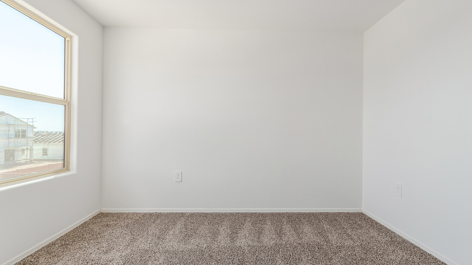 Step into The Grace, a charming two-story new home in the welcoming Senita Crossing community, designed for modern living with a blend of style and practicality. With 1,963 square feet, this home offers four bedrooms, two and a half bathrooms, and ample space for both family life and entertaining.  As you walk through the front porch and enter the home, you're greeted by a welcoming entryway that leads directly into the spacious great room. This central gathering space effortlessly connects to the dining area and kitchen, creating an inviting atmosphere for both daily activities and special occasions. The kitchen is equipped with granite countertops, a central island, and stylish Shaker cabinetry, making it as functional as it is aesthetically pleasing. A walk-in pantry provides additional storage, ensuring your kitchen remains organized and ready for any culinary adventure.  Upstairs, you’ll find all four bedrooms, each designed to offer comfort and privacy. The primary bedroom features a generous walk-in closet and an en-suite bathroom with dual sinks and a spacious shower, providing a serene space to unwind at the end of the day. The remaining three bedrooms share a full bathroom and are conveniently located near the laundry room, making household tasks more efficient.  The outdoor living space at The Grace is equally impressive. The covered patio offers a perfect spot to enjoy Tucson’s beautiful weather, whether you’re hosting a barbecue or simply relaxing outdoors.  Living in Senita Crossing means you’re part of a community that values both convenience and quality. Located on Tucson’s southeast side, this neighborhood offers easy access to I-10, making commutes to major employers like Raytheon and Davis-Monthan Air Force Base quick and easy. The University of Arizona is also within reach, making this an ideal location for both families and professionals.  Inside The Grace, you’ll find modern conveniences like 12”x12” ceramic tile flooring throughout most areas, granite countertops, and stainless steel appliances, including a gas range, microwave, and dishwasher. The Home is Connected® Smart Home package ensures that your home is as technologically advanced as it is comfortable, with features like a smart thermostat, video doorbell, keyless entry and more.  Energy efficiency is a priority at Senita Crossing, with homes designed to meet DOE Zero Energy Ready standards. Features like tankless water heaters, LED lighting, and advanced spray foam insulation contribute to lower energy costs and a reduced carbon footprint, making The Grace a sustainable and cost-effective living choice.  Senita Crossing also offers a range of family-friendly amenities, including a park with a playground, a ramada, and a grassy common area. The community’s maintained bike and walking trail connects to McCain Loop, providing plenty of opportunities for outdoor recreation.