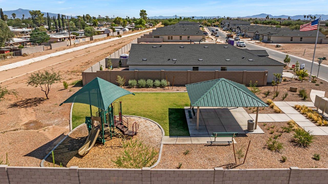 Step into The Gaven, a thoughtfully designed single-story new home nestled within the inviting Senita Crossing community. With 1,776 square feet of living space, this home offers four bedrooms and two bathrooms, ideal for those seeking a blend of functionality and modern style.  As you enter through the front porch, the foyer opens up to reveal a spacious and open layout that flows seamlessly from the entryway to the living areas. The great room serves as the heart of the home, connecting effortlessly to the dining area and kitchen, making it a perfect space for both relaxation and entertaining. The kitchen is a chef's delight, featuring a central island, granite countertops, and Shaker-style cabinetry, providing ample storage and a sleek, modern aesthetic. A large pantry adds to the kitchen’s practicality, ensuring all your culinary essentials are close at hand.  The primary bedroom is strategically placed at the rear of the home, offering a private and serene space complete with a walk-in closet and an en-suite bathroom featuring dual vanities and a spacious shower. The additional three bedrooms are situated toward the front of the home, sharing a full bathroom, making this layout ideal for families or hosting guests.  One of the highlights of The Gaven is its outdoor living space. The covered patio extends from the great room, offering an ideal spot to enjoy Tucson’s beautiful weather. Whether you’re hosting a barbecue, enjoying a quiet morning coffee, or simply relaxing outdoors, this space is designed to enhance your living experience.  Located in the thriving Senita Crossing community on Tucson’s southeast side, residents of The Gaven enjoy a variety of amenities designed for modern living. The community offers easy access to I-10, making commuting a breeze, and is conveniently situated near Davis-Monthan Air Force Base, Raytheon, and the University of Arizona, making it an ideal location for both families and professionals.   Inside The Gaven, you’ll find modern conveniences like 12”x12” ceramic tile flooring, granite countertops, and stainless steel appliances, including a gas range, microwave, and dishwasher. The Home is Connected® Smart Home package, featuring a smart thermostat, video doorbell, and keyless entry, ensures that your home is as functional as it is stylish.  Energy efficiency is a priority at Senita Crossing, with homes that meet DOE Zero Energy Ready standards. Features like tankless water heaters, LED lighting, and advanced spray foam insulation contribute to lower energy costs and a smaller carbon footprint, offering you a sustainable and cost-effective living environment.  Senita Crossing also boasts family-friendly amenities, including a park with a playground, a ramada, and a grassy common area, as well as a maintained bike and walking trail that connects to McCain Loop. The community is served by the highly regarded Sunnyside Unified School District, offering access to top-rated schools, ensuring a bright future for the young ones.  The Gaven at Senita Crossing is more than just a home—it’s a place where comfort, style, and modern living come together to create the perfect environment for you and your family.