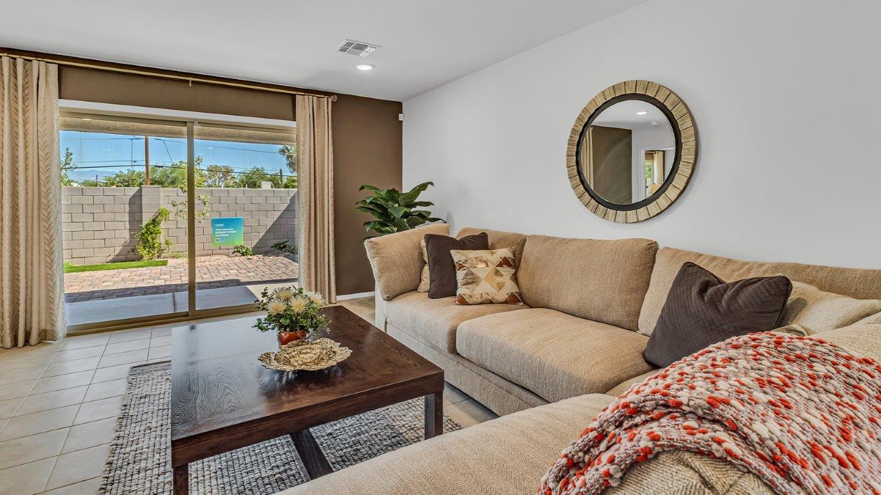 Step into The Gaven, a thoughtfully designed single-story new home nestled within the inviting Senita Crossing community. With 1,776 square feet of living space, this home offers four bedrooms and two bathrooms, ideal for those seeking a blend of functionality and modern style.  As you enter through the front porch, the foyer opens up to reveal a spacious and open layout that flows seamlessly from the entryway to the living areas. The great room serves as the heart of the home, connecting effortlessly to the dining area and kitchen, making it a perfect space for both relaxation and entertaining. The kitchen is a chef's delight, featuring a central island, granite countertops, and Shaker-style cabinetry, providing ample storage and a sleek, modern aesthetic. A large pantry adds to the kitchen’s practicality, ensuring all your culinary essentials are close at hand.  The primary bedroom is strategically placed at the rear of the home, offering a private and serene space complete with a walk-in closet and an en-suite bathroom featuring dual vanities and a spacious shower. The additional three bedrooms are situated toward the front of the home, sharing a full bathroom, making this layout ideal for families or hosting guests.  One of the highlights of The Gaven is its outdoor living space. The covered patio extends from the great room, offering an ideal spot to enjoy Tucson’s beautiful weather. Whether you’re hosting a barbecue, enjoying a quiet morning coffee, or simply relaxing outdoors, this space is designed to enhance your living experience.  Located in the thriving Senita Crossing community on Tucson’s southeast side, residents of The Gaven enjoy a variety of amenities designed for modern living. The community offers easy access to I-10, making commuting a breeze, and is conveniently situated near Davis-Monthan Air Force Base, Raytheon, and the University of Arizona, making it an ideal location for both families and professionals.   Inside The Gaven, you’ll find modern conveniences like 12”x12” ceramic tile flooring, granite countertops, and stainless steel appliances, including a gas range, microwave, and dishwasher. The Home is Connected® Smart Home package, featuring a smart thermostat, video doorbell, and keyless entry, ensures that your home is as functional as it is stylish.  Energy efficiency is a priority at Senita Crossing, with homes that meet DOE Zero Energy Ready standards. Features like tankless water heaters, LED lighting, and advanced spray foam insulation contribute to lower energy costs and a smaller carbon footprint, offering you a sustainable and cost-effective living environment.  Senita Crossing also boasts family-friendly amenities, including a park with a playground, a ramada, and a grassy common area, as well as a maintained bike and walking trail that connects to McCain Loop. The community is served by the highly regarded Sunnyside Unified School District, offering access to top-rated schools, ensuring a bright future for the young ones.  The Gaven at Senita Crossing is more than just a home—it’s a place where comfort, style, and modern living come together to create the perfect environment for you and your family.