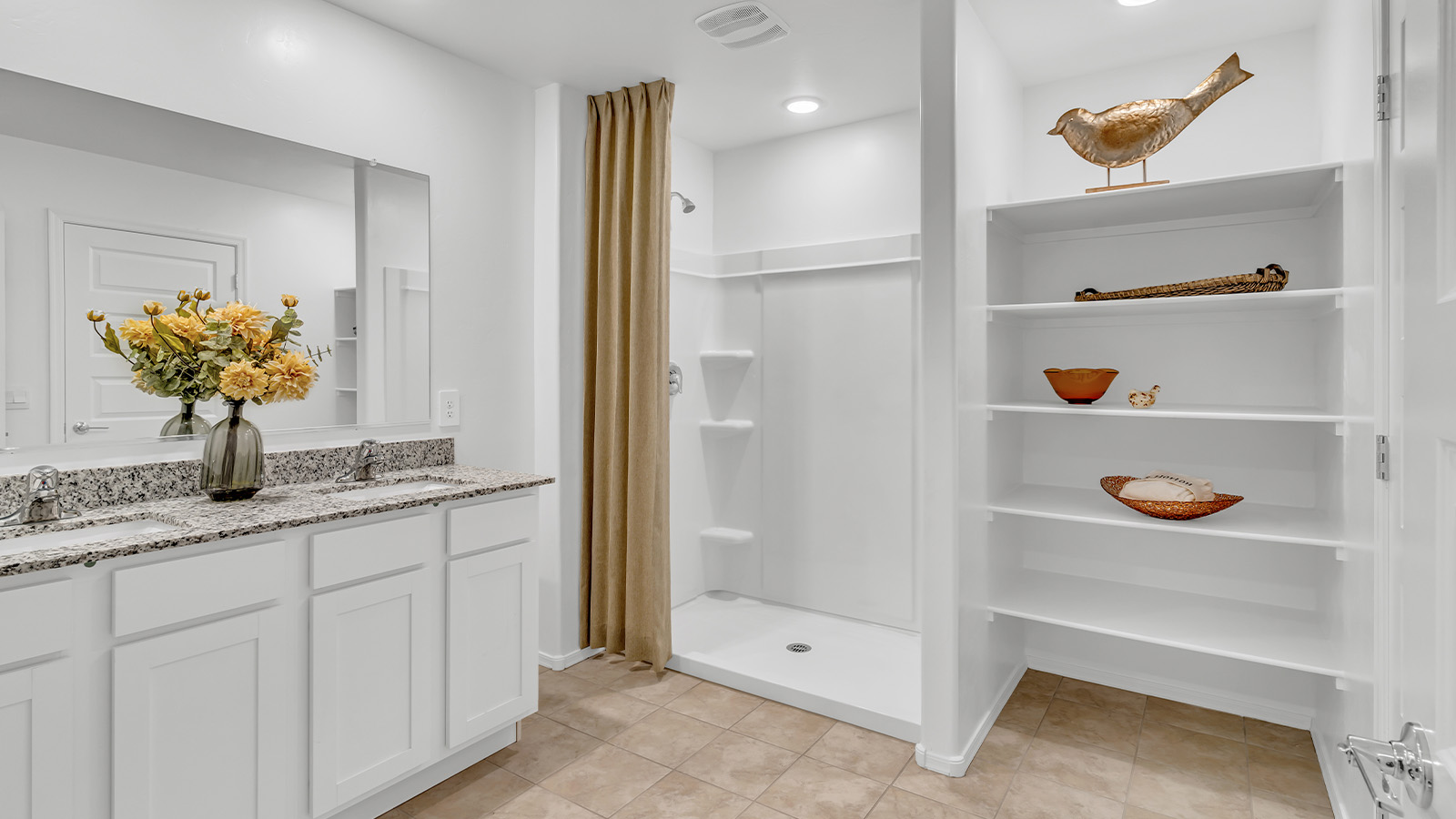 Step into The Gaven, a thoughtfully designed single-story new home nestled within the inviting Senita Crossing community. With 1,776 square feet of living space, this home offers four bedrooms and two bathrooms, ideal for those seeking a blend of functionality and modern style.  As you enter through the front porch, the foyer opens up to reveal a spacious and open layout that flows seamlessly from the entryway to the living areas. The great room serves as the heart of the home, connecting effortlessly to the dining area and kitchen, making it a perfect space for both relaxation and entertaining. The kitchen is a chef's delight, featuring a central island, granite countertops, and Shaker-style cabinetry, providing ample storage and a sleek, modern aesthetic. A large pantry adds to the kitchen’s practicality, ensuring all your culinary essentials are close at hand.  The primary bedroom is strategically placed at the rear of the home, offering a private and serene space complete with a walk-in closet and an en-suite bathroom featuring dual vanities and a spacious shower. The additional three bedrooms are situated toward the front of the home, sharing a full bathroom, making this layout ideal for families or hosting guests.  One of the highlights of The Gaven is its outdoor living space. The covered patio extends from the great room, offering an ideal spot to enjoy Tucson’s beautiful weather. Whether you’re hosting a barbecue, enjoying a quiet morning coffee, or simply relaxing outdoors, this space is designed to enhance your living experience.  Located in the thriving Senita Crossing community on Tucson’s southeast side, residents of The Gaven enjoy a variety of amenities designed for modern living. The community offers easy access to I-10, making commuting a breeze, and is conveniently situated near Davis-Monthan Air Force Base, Raytheon, and the University of Arizona, making it an ideal location for both families and professionals.   Inside The Gaven, you’ll find modern conveniences like 12”x12” ceramic tile flooring, granite countertops, and stainless steel appliances, including a gas range, microwave, and dishwasher. The Home is Connected® Smart Home package, featuring a smart thermostat, video doorbell, and keyless entry, ensures that your home is as functional as it is stylish.  Energy efficiency is a priority at Senita Crossing, with homes that meet DOE Zero Energy Ready standards. Features like tankless water heaters, LED lighting, and advanced spray foam insulation contribute to lower energy costs and a smaller carbon footprint, offering you a sustainable and cost-effective living environment.  Senita Crossing also boasts family-friendly amenities, including a park with a playground, a ramada, and a grassy common area, as well as a maintained bike and walking trail that connects to McCain Loop. The community is served by the highly regarded Sunnyside Unified School District, offering access to top-rated schools, ensuring a bright future for the young ones.  The Gaven at Senita Crossing is more than just a home—it’s a place where comfort, style, and modern living come together to create the perfect environment for you and your family.