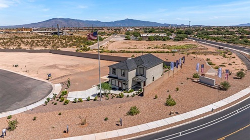 Discover Blackhawk, a vibrant new home community by D.R. Horton in Tucson, Arizona, offering the perfect blend of convenience, quality, and the joys of Arizona living. Located just minutes from I-10, Blackhawk provides easy access to downtown Tucson, the University of Arizona, and major employers like Davis-Monthan Air Force Base, Raytheon, and Tucson International Airport. This prime location ensures that shopping, dining, and entertainment are never far away, making it an ideal choice for families, professionals, and retirees alike. Blackhawk features a range of thoughtfully designed homes, with options ranging from 3 to 5 bedrooms and 1,300 to 2,500 square feet. These homes are crafted for comfort, style, and energy efficiency, featuring granite countertops in the kitchen and bathrooms, tile flooring throughout the main areas, spacious walk-in closets, dual vanities in the master bathroom, and expansive lots for outdoor living. Each home is built with a Spanish lace stucco exterior and comes with a landscaped front yard, complete with an auto drip irrigation system. Additionally, these homes are equipped with D.R. Horton’s Home is Connected Smart Home package, which includes a smart thermostat, video doorbell, keyless entry, Deako Smart Switches, a Wi-Fi-enabled garage door opener and more! Living in Blackhawk means enjoying the benefits of a Zero Energy Ready Home, built to meet rigorous energy efficiency and performance standards. These high-performance homes are designed to save you money on energy costs while reducing your environmental footprint. The community itself offers a variety of amenities, including playgrounds with jungle gyms, parks, ramadas, and walking and biking trails that encourage a healthy, active lifestyle. The Sunnyside School District serves Blackhawk, with top-rated schools like Craycroft Elementary, Billy Lane Middle School, and Desert View High School nearby. Families will appreciate the safe, welcoming environment of the community, as well as the abundance of nearby parks and recreational opportunities. Outdoor enthusiasts will love the proximity to Saguaro National Park, Cienega Creek Natural Preserve, and Del Lago Golf Club, offering endless opportunities for hiking, cycling, and exploring the stunning Arizona landscape. Blackhawk is situated in a rapidly growing area of Tucson, providing affordable housing in a community that is as vibrant as it is welcoming. With ongoing development projects and a strong sense of community, Blackhawk promises a bright future for all its residents. Experience the best of Arizona living at Blackhawk, where quality, convenience, and community come together beautifully.
