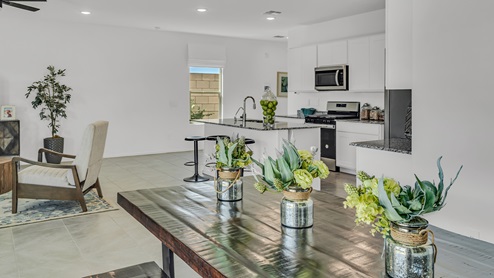 Discover Blackhawk, a vibrant new home community by D.R. Horton in Tucson, Arizona, offering the perfect blend of convenience, quality, and the joys of Arizona living. Located just minutes from I-10, Blackhawk provides easy access to downtown Tucson, the University of Arizona, and major employers like Davis-Monthan Air Force Base, Raytheon, and Tucson International Airport. This prime location ensures that shopping, dining, and entertainment are never far away, making it an ideal choice for families, professionals, and retirees alike. Blackhawk features a range of thoughtfully designed homes, with options ranging from 3 to 5 bedrooms and 1,300 to 2,500 square feet. These homes are crafted for comfort, style, and energy efficiency, featuring granite countertops in the kitchen and bathrooms, tile flooring throughout the main areas, spacious walk-in closets, dual vanities in the master bathroom, and expansive lots for outdoor living. Each home is built with a Spanish lace stucco exterior and comes with a landscaped front yard, complete with an auto drip irrigation system. Additionally, these homes are equipped with D.R. Horton’s Home is Connected Smart Home package, which includes a smart thermostat, video doorbell, keyless entry, Deako Smart Switches, a Wi-Fi-enabled garage door opener and more! Living in Blackhawk means enjoying the benefits of a Zero Energy Ready Home, built to meet rigorous energy efficiency and performance standards. These high-performance homes are designed to save you money on energy costs while reducing your environmental footprint. The community itself offers a variety of amenities, including playgrounds with jungle gyms, parks, ramadas, and walking and biking trails that encourage a healthy, active lifestyle. The Sunnyside School District serves Blackhawk, with top-rated schools like Craycroft Elementary, Billy Lane Middle School, and Desert View High School nearby. Families will appreciate the safe, welcoming environment of the community, as well as the abundance of nearby parks and recreational opportunities. Outdoor enthusiasts will love the proximity to Saguaro National Park, Cienega Creek Natural Preserve, and Del Lago Golf Club, offering endless opportunities for hiking, cycling, and exploring the stunning Arizona landscape. Blackhawk is situated in a rapidly growing area of Tucson, providing affordable housing in a community that is as vibrant as it is welcoming. With ongoing development projects and a strong sense of community, Blackhawk promises a bright future for all its residents. Experience the best of Arizona living at Blackhawk, where quality, convenience, and community come together beautifully.