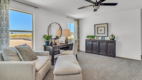 Discover Blackhawk, a vibrant new home community by D.R. Horton in Tucson, Arizona, offering the perfect blend of convenience, quality, and the joys of Arizona living. Located just minutes from I-10, Blackhawk provides easy access to downtown Tucson, the University of Arizona, and major employers like Davis-Monthan Air Force Base, Raytheon, and Tucson International Airport. This prime location ensures that shopping, dining, and entertainment are never far away, making it an ideal choice for families, professionals, and retirees alike. Blackhawk features a range of thoughtfully designed homes, with options ranging from 3 to 5 bedrooms and 1,300 to 2,500 square feet. These homes are crafted for comfort, style, and energy efficiency, featuring granite countertops in the kitchen and bathrooms, tile flooring throughout the main areas, spacious walk-in closets, dual vanities in the master bathroom, and expansive lots for outdoor living. Each home is built with a Spanish lace stucco exterior and comes with a landscaped front yard, complete with an auto drip irrigation system. Additionally, these homes are equipped with D.R. Horton’s Home is Connected Smart Home package, which includes a smart thermostat, video doorbell, keyless entry, Deako Smart Switches, a Wi-Fi-enabled garage door opener and more! Living in Blackhawk means enjoying the benefits of a Zero Energy Ready Home, built to meet rigorous energy efficiency and performance standards. These high-performance homes are designed to save you money on energy costs while reducing your environmental footprint. The community itself offers a variety of amenities, including playgrounds with jungle gyms, parks, ramadas, and walking and biking trails that encourage a healthy, active lifestyle. The Sunnyside School District serves Blackhawk, with top-rated schools like Craycroft Elementary, Billy Lane Middle School, and Desert View High School nearby. Families will appreciate the safe, welcoming environment of the community, as well as the abundance of nearby parks and recreational opportunities. Outdoor enthusiasts will love the proximity to Saguaro National Park, Cienega Creek Natural Preserve, and Del Lago Golf Club, offering endless opportunities for hiking, cycling, and exploring the stunning Arizona landscape. Blackhawk is situated in a rapidly growing area of Tucson, providing affordable housing in a community that is as vibrant as it is welcoming. With ongoing development projects and a strong sense of community, Blackhawk promises a bright future for all its residents. Experience the best of Arizona living at Blackhawk, where quality, convenience, and community come together beautifully.
