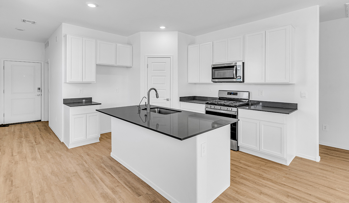 Welcome to The Amber at Blackhawk in Tucson, Arizona – a charming 1,331 sq. ft. single-story new home designed to offer both comfort and style in a prime location.  As you step through the front porch, you're greeted by an inviting entryway that opens up into a beautifully designed living space. The great room serves as the heart of the home, providing a spacious area for relaxing, entertaining, or enjoying family time. This open-concept design flows seamlessly into the dining area and kitchen.  The kitchen is a true centerpiece, featuring elegant quartz countertops, modern appliances, a pantry for ample storage, and a convenient breakfast bar. Whether you’re preparing a quick meal or hosting a dinner party, this kitchen is equipped to meet your needs with both style and functionality.  Just off the great room, you’ll find the primary bedroom – a private retreat designed for relaxation. The primary bedroom is generously sized and includes a walk-in closet and an en-suite bathroom, offering both luxury and convenience.   The Amber also includes two additional bedrooms, well-positioned to share a full bathroom. These rooms are ideal for family members, guests, or even a home office.  For added convenience, the home includes a utility room located near the bedrooms, and a two-car garage that offers both storage and functionality. Step outside to the covered patio, where you can unwind and enjoy Tucson’s beautiful weather year-round. Whether you’re sipping your morning coffee or hosting a weekend barbecue, this outdoor space extends your living area into the serene surroundings of Blackhawk.  Designed with energy efficiency in mind, The Amber at Blackhawk is a DOE Zero Energy Ready Home, ensuring long-term savings and a sustainable living environment.  *Images shown are for reference only. They depict the Amber layout and specification home and may not represent the actual home.