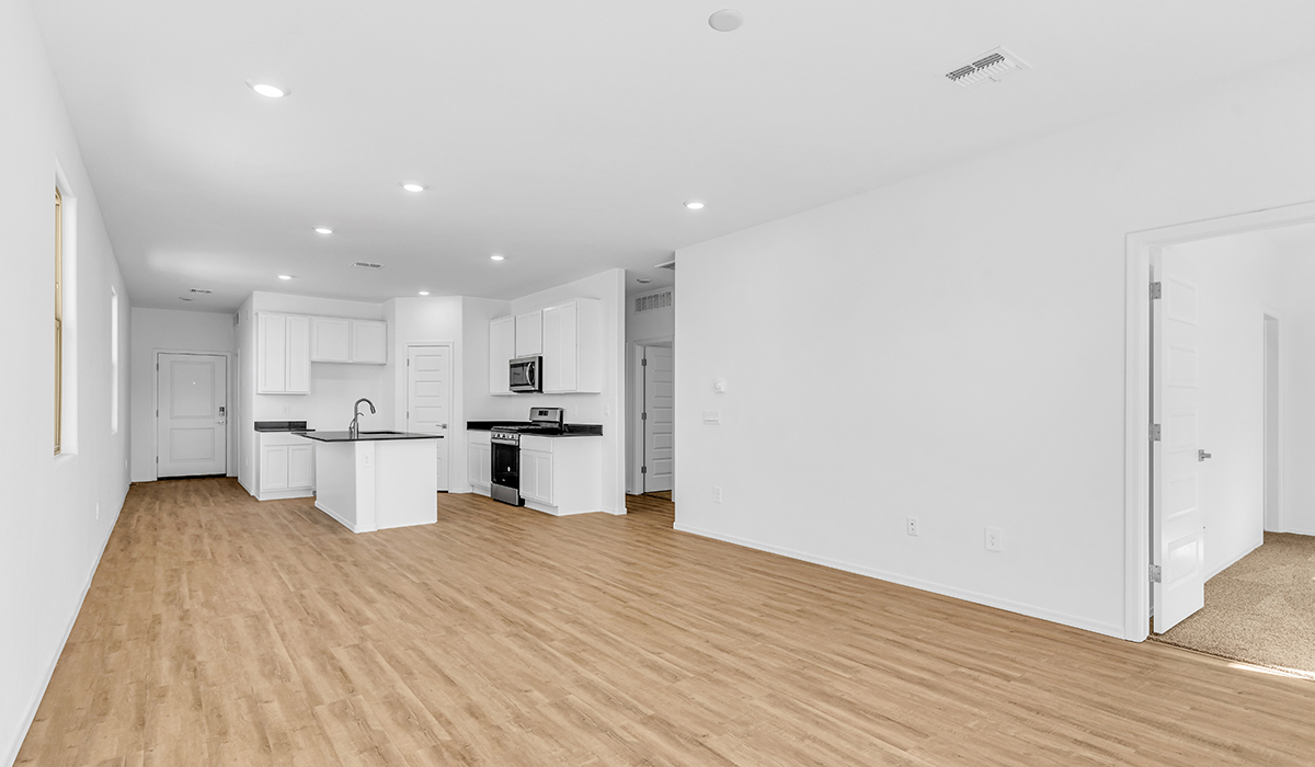 Welcome to The Amber at Blackhawk in Tucson, Arizona – a charming 1,331 sq. ft. single-story new home designed to offer both comfort and style in a prime location.  As you step through the front porch, you're greeted by an inviting entryway that opens up into a beautifully designed living space. The great room serves as the heart of the home, providing a spacious area for relaxing, entertaining, or enjoying family time. This open-concept design flows seamlessly into the dining area and kitchen.  The kitchen is a true centerpiece, featuring elegant quartz countertops, modern appliances, a pantry for ample storage, and a convenient breakfast bar. Whether you’re preparing a quick meal or hosting a dinner party, this kitchen is equipped to meet your needs with both style and functionality.  Just off the great room, you’ll find the primary bedroom – a private retreat designed for relaxation. The primary bedroom is generously sized and includes a walk-in closet and an en-suite bathroom, offering both luxury and convenience.   The Amber also includes two additional bedrooms, well-positioned to share a full bathroom. These rooms are ideal for family members, guests, or even a home office.  For added convenience, the home includes a utility room located near the bedrooms, and a two-car garage that offers both storage and functionality. Step outside to the covered patio, where you can unwind and enjoy Tucson’s beautiful weather year-round. Whether you’re sipping your morning coffee or hosting a weekend barbecue, this outdoor space extends your living area into the serene surroundings of Blackhawk.  Designed with energy efficiency in mind, The Amber at Blackhawk is a DOE Zero Energy Ready Home, ensuring long-term savings and a sustainable living environment.  *Images shown are for reference only. They depict the Amber layout and specification home and may not represent the actual home.