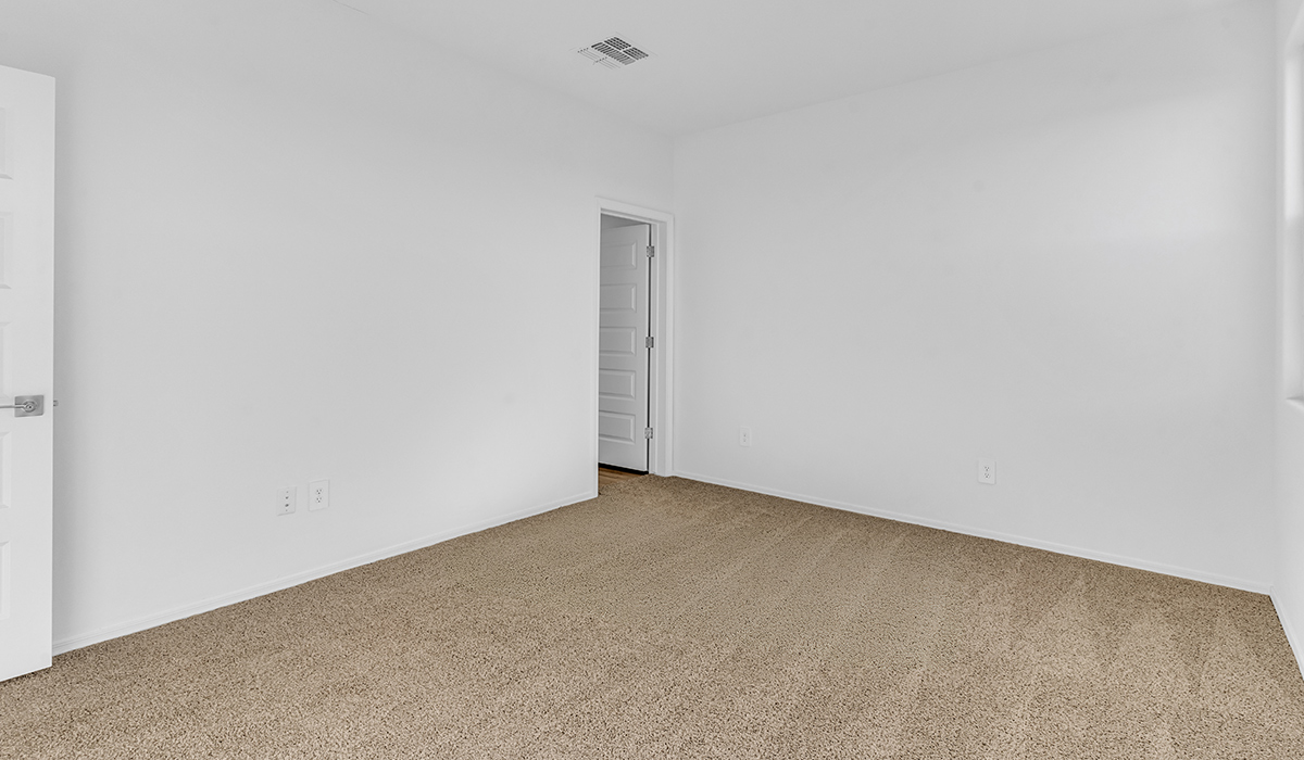 Welcome to The Amber at Blackhawk in Tucson, Arizona – a charming 1,331 sq. ft. single-story new home designed to offer both comfort and style in a prime location.  As you step through the front porch, you're greeted by an inviting entryway that opens up into a beautifully designed living space. The great room serves as the heart of the home, providing a spacious area for relaxing, entertaining, or enjoying family time. This open-concept design flows seamlessly into the dining area and kitchen.  The kitchen is a true centerpiece, featuring elegant quartz countertops, modern appliances, a pantry for ample storage, and a convenient breakfast bar. Whether you’re preparing a quick meal or hosting a dinner party, this kitchen is equipped to meet your needs with both style and functionality.  Just off the great room, you’ll find the primary bedroom – a private retreat designed for relaxation. The primary bedroom is generously sized and includes a walk-in closet and an en-suite bathroom, offering both luxury and convenience.   The Amber also includes two additional bedrooms, well-positioned to share a full bathroom. These rooms are ideal for family members, guests, or even a home office.  For added convenience, the home includes a utility room located near the bedrooms, and a two-car garage that offers both storage and functionality. Step outside to the covered patio, where you can unwind and enjoy Tucson’s beautiful weather year-round. Whether you’re sipping your morning coffee or hosting a weekend barbecue, this outdoor space extends your living area into the serene surroundings of Blackhawk.  Designed with energy efficiency in mind, The Amber at Blackhawk is a DOE Zero Energy Ready Home, ensuring long-term savings and a sustainable living environment.  *Images shown are for reference only. They depict the Amber layout and specification home and may not represent the actual home.