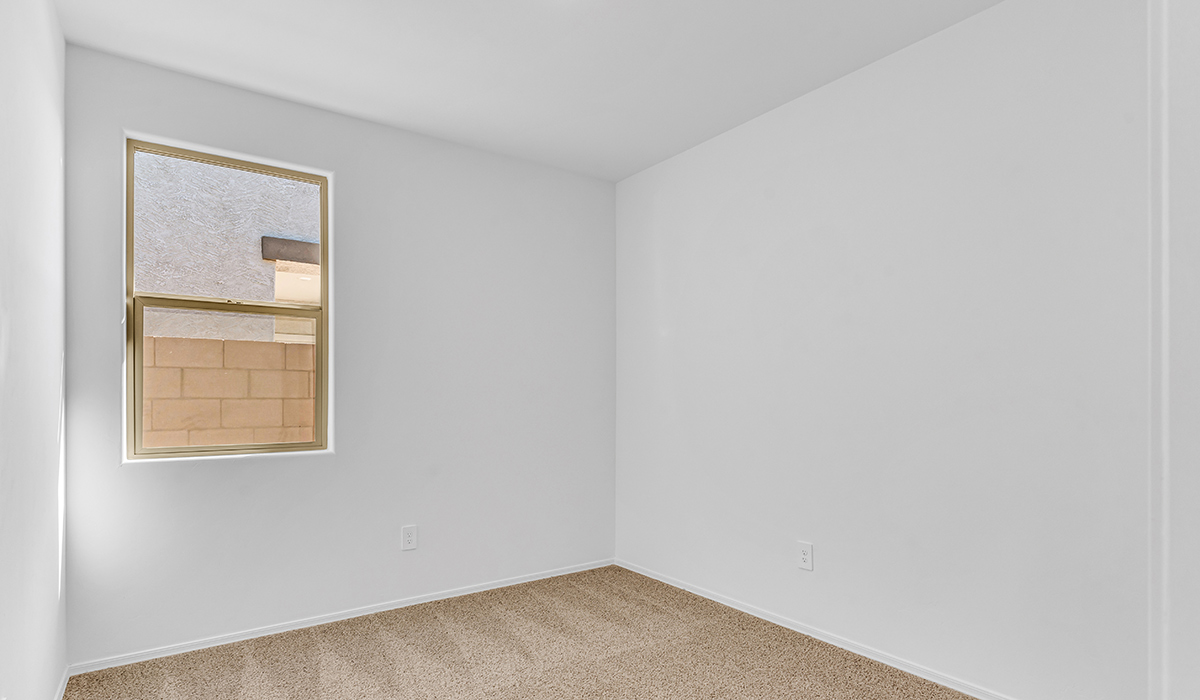 Welcome to The Amber at Blackhawk in Tucson, Arizona – a charming 1,331 sq. ft. single-story new home designed to offer both comfort and style in a prime location.  As you step through the front porch, you're greeted by an inviting entryway that opens up into a beautifully designed living space. The great room serves as the heart of the home, providing a spacious area for relaxing, entertaining, or enjoying family time. This open-concept design flows seamlessly into the dining area and kitchen.  The kitchen is a true centerpiece, featuring elegant quartz countertops, modern appliances, a pantry for ample storage, and a convenient breakfast bar. Whether you’re preparing a quick meal or hosting a dinner party, this kitchen is equipped to meet your needs with both style and functionality.  Just off the great room, you’ll find the primary bedroom – a private retreat designed for relaxation. The primary bedroom is generously sized and includes a walk-in closet and an en-suite bathroom, offering both luxury and convenience.   The Amber also includes two additional bedrooms, well-positioned to share a full bathroom. These rooms are ideal for family members, guests, or even a home office.  For added convenience, the home includes a utility room located near the bedrooms, and a two-car garage that offers both storage and functionality. Step outside to the covered patio, where you can unwind and enjoy Tucson’s beautiful weather year-round. Whether you’re sipping your morning coffee or hosting a weekend barbecue, this outdoor space extends your living area into the serene surroundings of Blackhawk.  Designed with energy efficiency in mind, The Amber at Blackhawk is a DOE Zero Energy Ready Home, ensuring long-term savings and a sustainable living environment.  *Images shown are for reference only. They depict the Amber layout and specification home and may not represent the actual home.