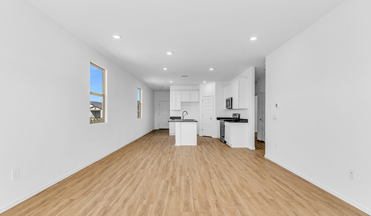 Welcome to The Amber at Blackhawk in Tucson, Arizona – a charming 1,331 sq. ft. single-story new home designed to offer both comfort and style in a prime location.  As you step through the front porch, you're greeted by an inviting entryway that opens up into a beautifully designed living space. The great room serves as the heart of the home, providing a spacious area for relaxing, entertaining, or enjoying family time. This open-concept design flows seamlessly into the dining area and kitchen.  The kitchen is a true centerpiece, featuring elegant quartz countertops, modern appliances, a pantry for ample storage, and a convenient breakfast bar. Whether you’re preparing a quick meal or hosting a dinner party, this kitchen is equipped to meet your needs with both style and functionality.  Just off the great room, you’ll find the primary bedroom – a private retreat designed for relaxation. The primary bedroom is generously sized and includes a walk-in closet and an en-suite bathroom, offering both luxury and convenience.   The Amber also includes two additional bedrooms, well-positioned to share a full bathroom. These rooms are ideal for family members, guests, or even a home office.  For added convenience, the home includes a utility room located near the bedrooms, and a two-car garage that offers both storage and functionality. Step outside to the covered patio, where you can unwind and enjoy Tucson’s beautiful weather year-round. Whether you’re sipping your morning coffee or hosting a weekend barbecue, this outdoor space extends your living area into the serene surroundings of Blackhawk.  Designed with energy efficiency in mind, The Amber at Blackhawk is a DOE Zero Energy Ready Home, ensuring long-term savings and a sustainable living environment.  *Images shown are for reference only. They depict the Amber model and may not represent the actual home.