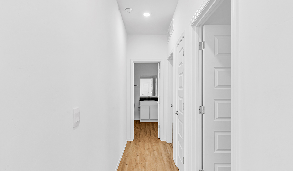 Welcome to The Amber at Blackhawk in Tucson, Arizona – a charming 1,331 sq. ft. single-story new home designed to offer both comfort and style in a prime location.  As you step through the front porch, you're greeted by an inviting entryway that opens up into a beautifully designed living space. The great room serves as the heart of the home, providing a spacious area for relaxing, entertaining, or enjoying family time. This open-concept design flows seamlessly into the dining area and kitchen.  The kitchen is a true centerpiece, featuring elegant quartz countertops, modern appliances, a pantry for ample storage, and a convenient breakfast bar. Whether you’re preparing a quick meal or hosting a dinner party, this kitchen is equipped to meet your needs with both style and functionality.  Just off the great room, you’ll find the primary bedroom – a private retreat designed for relaxation. The primary bedroom is generously sized and includes a walk-in closet and an en-suite bathroom, offering both luxury and convenience.   The Amber also includes two additional bedrooms, well-positioned to share a full bathroom. These rooms are ideal for family members, guests, or even a home office.  For added convenience, the home includes a utility room located near the bedrooms, and a two-car garage that offers both storage and functionality. Step outside to the covered patio, where you can unwind and enjoy Tucson’s beautiful weather year-round. Whether you’re sipping your morning coffee or hosting a weekend barbecue, this outdoor space extends your living area into the serene surroundings of Blackhawk.  Designed with energy efficiency in mind, The Amber at Blackhawk is a DOE Zero Energy Ready Home, ensuring long-term savings and a sustainable living environment.  *Images shown are for reference only. They depict the Amber model and may not represent the actual home.