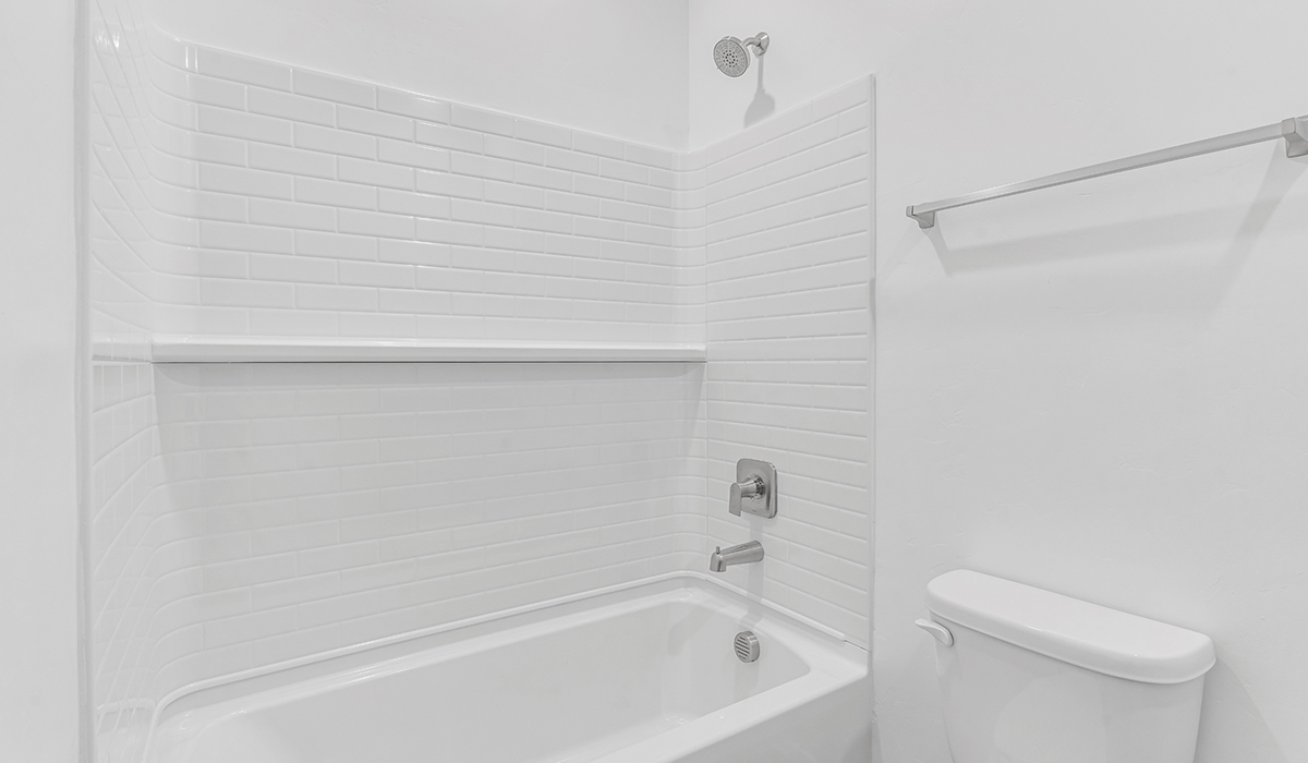 Welcome to The Amber at Blackhawk in Tucson, Arizona – a charming 1,331 sq. ft. single-story new home designed to offer both comfort and style in a prime location.  As you step through the front porch, you're greeted by an inviting entryway that opens up into a beautifully designed living space. The great room serves as the heart of the home, providing a spacious area for relaxing, entertaining, or enjoying family time. This open-concept design flows seamlessly into the dining area and kitchen.  The kitchen is a true centerpiece, featuring elegant quartz countertops, modern appliances, a pantry for ample storage, and a convenient breakfast bar. Whether you’re preparing a quick meal or hosting a dinner party, this kitchen is equipped to meet your needs with both style and functionality.  Just off the great room, you’ll find the primary bedroom – a private retreat designed for relaxation. The primary bedroom is generously sized and includes a walk-in closet and an en-suite bathroom, offering both luxury and convenience.   The Amber also includes two additional bedrooms, well-positioned to share a full bathroom. These rooms are ideal for family members, guests, or even a home office.  For added convenience, the home includes a utility room located near the bedrooms, and a two-car garage that offers both storage and functionality. Step outside to the covered patio, where you can unwind and enjoy Tucson’s beautiful weather year-round. Whether you’re sipping your morning coffee or hosting a weekend barbecue, this outdoor space extends your living area into the serene surroundings of Blackhawk.  Designed with energy efficiency in mind, The Amber at Blackhawk is a DOE Zero Energy Ready Home, ensuring long-term savings and a sustainable living environment.  *Images shown are for reference only. They depict the Amber model and may not represent the actual home.