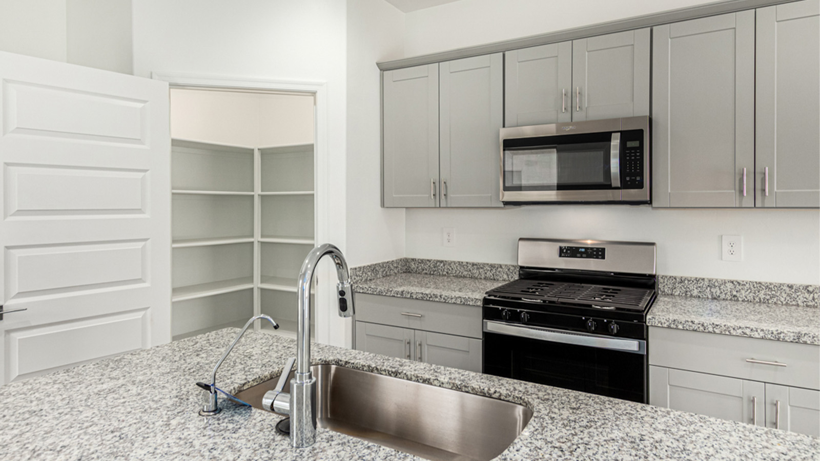 Welcome to The Amber at Blackhawk in Tucson, Arizona – a charming 1,331 sq. ft. single-story new home designed to offer both comfort and style in a prime location.  As you step through the front porch, you're greeted by an inviting entryway that opens up into a beautifully designed living space. The great room serves as the heart of the home, providing a spacious area for relaxing, entertaining, or enjoying family time. This open-concept design flows seamlessly into the dining area and kitchen.  The kitchen is a true centerpiece, featuring elegant quartz countertops, modern appliances, a pantry for ample storage, and a convenient breakfast bar. Whether you’re preparing a quick meal or hosting a dinner party, this kitchen is equipped to meet your needs with both style and functionality.  Just off the great room, you’ll find the primary bedroom – a private retreat designed for relaxation. The primary bedroom is generously sized and includes a walk-in closet and an en-suite bathroom, offering both luxury and convenience.   The Amber also includes two additional bedrooms, well-positioned to share a full bathroom. These rooms are ideal for family members, guests, or even a home office.  For added convenience, the home includes a utility room located near the bedrooms, and a two-car garage that offers both storage and functionality. Step outside to the covered patio, where you can unwind and enjoy Tucson’s beautiful weather year-round. Whether you’re sipping your morning coffee or hosting a weekend barbecue, this outdoor space extends your living area into the serene surroundings of Blackhawk.  Designed with energy efficiency in mind, The Amber at Blackhawk is a DOE Zero Energy Ready Home, ensuring long-term savings and a sustainable living environment.  *Images shown are for reference only. They depict the Amber model and may not represent the actual home.