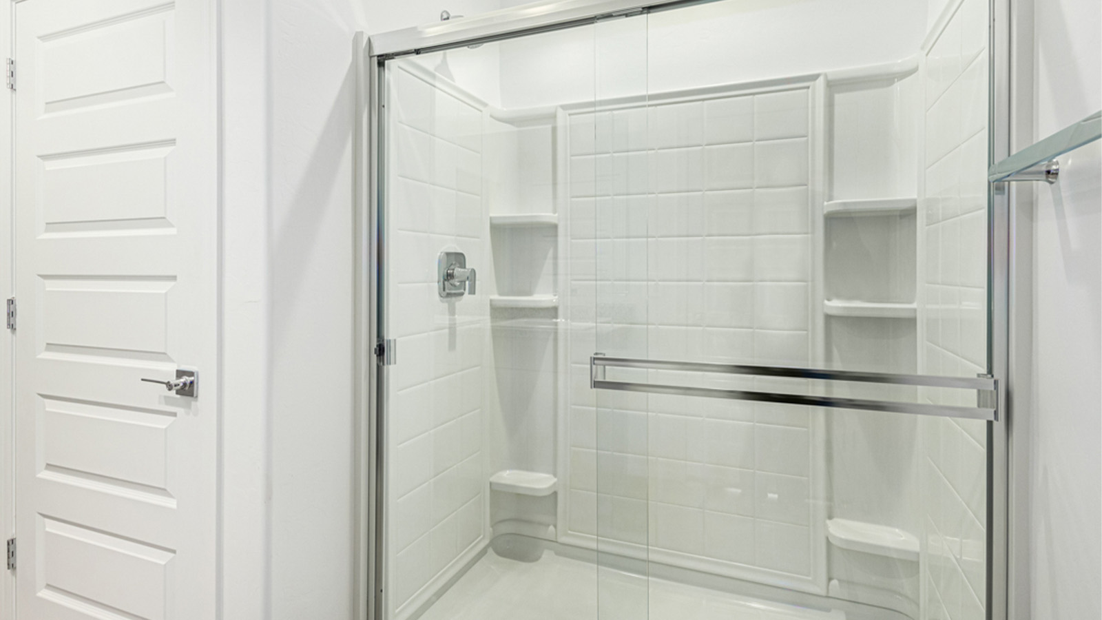 Welcome to The Amber at Blackhawk in Tucson, Arizona – a charming 1,331 sq. ft. single-story new home designed to offer both comfort and style in a prime location.  As you step through the front porch, you're greeted by an inviting entryway that opens up into a beautifully designed living space. The great room serves as the heart of the home, providing a spacious area for relaxing, entertaining, or enjoying family time. This open-concept design flows seamlessly into the dining area and kitchen.  The kitchen is a true centerpiece, featuring elegant quartz countertops, modern appliances, a pantry for ample storage, and a convenient breakfast bar. Whether you’re preparing a quick meal or hosting a dinner party, this kitchen is equipped to meet your needs with both style and functionality.  Just off the great room, you’ll find the primary bedroom – a private retreat designed for relaxation. The primary bedroom is generously sized and includes a walk-in closet and an en-suite bathroom, offering both luxury and convenience.   The Amber also includes two additional bedrooms, well-positioned to share a full bathroom. These rooms are ideal for family members, guests, or even a home office.  For added convenience, the home includes a utility room located near the bedrooms, and a two-car garage that offers both storage and functionality. Step outside to the covered patio, where you can unwind and enjoy Tucson’s beautiful weather year-round. Whether you’re sipping your morning coffee or hosting a weekend barbecue, this outdoor space extends your living area into the serene surroundings of Blackhawk.  Designed with energy efficiency in mind, The Amber at Blackhawk is a DOE Zero Energy Ready Home, ensuring long-term savings and a sustainable living environment.  *Images shown are for reference only. They depict the Amber model and may not represent the actual home.