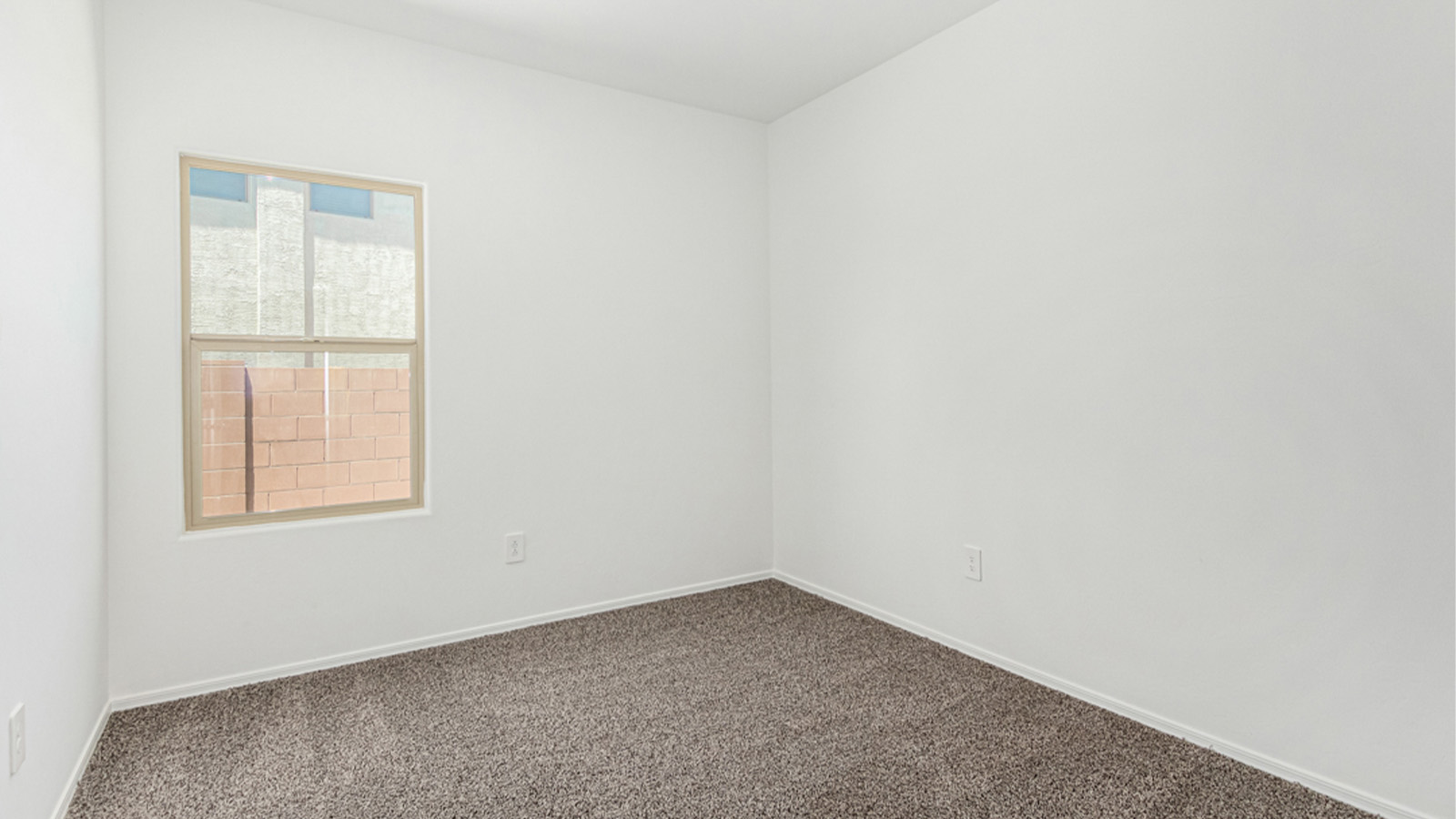 Welcome to The Amber at Blackhawk in Tucson, Arizona – a charming 1,331 sq. ft. single-story new home designed to offer both comfort and style in a prime location.  As you step through the front porch, you're greeted by an inviting entryway that opens up into a beautifully designed living space. The great room serves as the heart of the home, providing a spacious area for relaxing, entertaining, or enjoying family time. This open-concept design flows seamlessly into the dining area and kitchen.  The kitchen is a true centerpiece, featuring elegant quartz countertops, modern appliances, a pantry for ample storage, and a convenient breakfast bar. Whether you’re preparing a quick meal or hosting a dinner party, this kitchen is equipped to meet your needs with both style and functionality.  Just off the great room, you’ll find the primary bedroom – a private retreat designed for relaxation. The primary bedroom is generously sized and includes a walk-in closet and an en-suite bathroom, offering both luxury and convenience.   The Amber also includes two additional bedrooms, well-positioned to share a full bathroom. These rooms are ideal for family members, guests, or even a home office.  For added convenience, the home includes a utility room located near the bedrooms, and a two-car garage that offers both storage and functionality. Step outside to the covered patio, where you can unwind and enjoy Tucson’s beautiful weather year-round. Whether you’re sipping your morning coffee or hosting a weekend barbecue, this outdoor space extends your living area into the serene surroundings of Blackhawk.  Designed with energy efficiency in mind, The Amber at Blackhawk is a DOE Zero Energy Ready Home, ensuring long-term savings and a sustainable living environment.  *Images shown are for reference only. They depict the Amber model and may not represent the actual home.