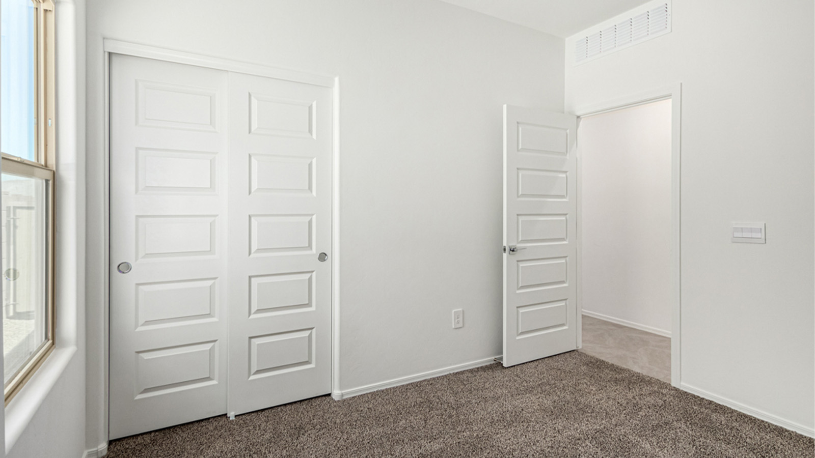 Welcome to The Amber at Blackhawk in Tucson, Arizona – a charming 1,331 sq. ft. single-story new home designed to offer both comfort and style in a prime location.  As you step through the front porch, you're greeted by an inviting entryway that opens up into a beautifully designed living space. The great room serves as the heart of the home, providing a spacious area for relaxing, entertaining, or enjoying family time. This open-concept design flows seamlessly into the dining area and kitchen.  The kitchen is a true centerpiece, featuring elegant quartz countertops, modern appliances, a pantry for ample storage, and a convenient breakfast bar. Whether you’re preparing a quick meal or hosting a dinner party, this kitchen is equipped to meet your needs with both style and functionality.  Just off the great room, you’ll find the primary bedroom – a private retreat designed for relaxation. The primary bedroom is generously sized and includes a walk-in closet and an en-suite bathroom, offering both luxury and convenience.   The Amber also includes two additional bedrooms, well-positioned to share a full bathroom. These rooms are ideal for family members, guests, or even a home office.  For added convenience, the home includes a utility room located near the bedrooms, and a two-car garage that offers both storage and functionality. Step outside to the covered patio, where you can unwind and enjoy Tucson’s beautiful weather year-round. Whether you’re sipping your morning coffee or hosting a weekend barbecue, this outdoor space extends your living area into the serene surroundings of Blackhawk.  Designed with energy efficiency in mind, The Amber at Blackhawk is a DOE Zero Energy Ready Home, ensuring long-term savings and a sustainable living environment.  *Images shown are for reference only. They depict the Amber model and may not represent the actual home.