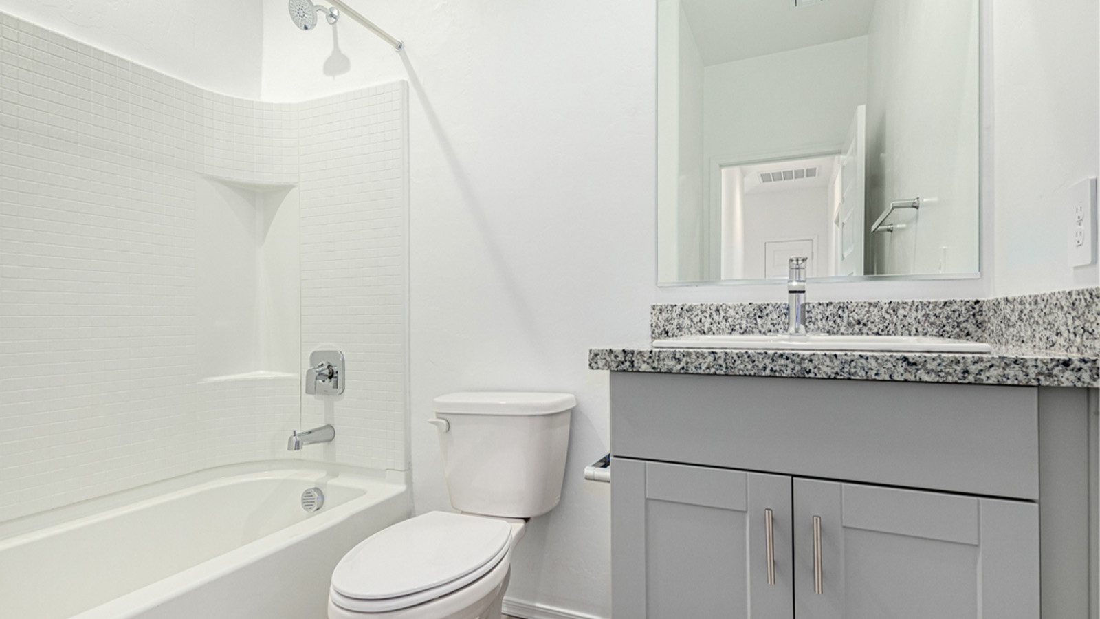 Welcome to The Amber at Blackhawk in Tucson, Arizona – a charming 1,331 sq. ft. single-story new home designed to offer both comfort and style in a prime location.  As you step through the front porch, you're greeted by an inviting entryway that opens up into a beautifully designed living space. The great room serves as the heart of the home, providing a spacious area for relaxing, entertaining, or enjoying family time. This open-concept design flows seamlessly into the dining area and kitchen.  The kitchen is a true centerpiece, featuring elegant quartz countertops, modern appliances, a pantry for ample storage, and a convenient breakfast bar. Whether you’re preparing a quick meal or hosting a dinner party, this kitchen is equipped to meet your needs with both style and functionality.  Just off the great room, you’ll find the primary bedroom – a private retreat designed for relaxation. The primary bedroom is generously sized and includes a walk-in closet and an en-suite bathroom, offering both luxury and convenience.   The Amber also includes two additional bedrooms, well-positioned to share a full bathroom. These rooms are ideal for family members, guests, or even a home office.  For added convenience, the home includes a utility room located near the bedrooms, and a two-car garage that offers both storage and functionality. Step outside to the covered patio, where you can unwind and enjoy Tucson’s beautiful weather year-round. Whether you’re sipping your morning coffee or hosting a weekend barbecue, this outdoor space extends your living area into the serene surroundings of Blackhawk.  Designed with energy efficiency in mind, The Amber at Blackhawk is a DOE Zero Energy Ready Home, ensuring long-term savings and a sustainable living environment.  *Images shown are for reference only. They depict the Amber model and may not represent the actual home.