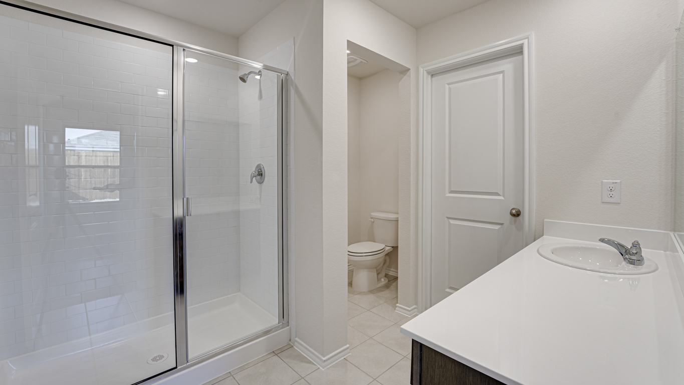 Welcome to The Amber at Blackhawk in Tucson, Arizona – a charming 1,331 sq. ft. single-story new home designed to offer both comfort and style in a prime location.  As you step through the front porch, you're greeted by an inviting entryway that opens up into a beautifully designed living space. The great room serves as the heart of the home, providing a spacious area for relaxing, entertaining, or enjoying family time. This open-concept design flows seamlessly into the dining area and kitchen.  The kitchen is a true centerpiece, featuring elegant quartz countertops, modern appliances, a pantry for ample storage, and a convenient breakfast bar. Whether you’re preparing a quick meal or hosting a dinner party, this kitchen is equipped to meet your needs with both style and functionality.  Just off the great room, you’ll find the primary bedroom – a private retreat designed for relaxation. The primary bedroom is generously sized and includes a walk-in closet and an en-suite bathroom, offering both luxury and convenience.   The Amber also includes two additional bedrooms, well-positioned to share a full bathroom. These rooms are ideal for family members, guests, or even a home office.  For added convenience, the home includes a utility room located near the bedrooms, and a two-car garage that offers both storage and functionality. Step outside to the covered patio, where you can unwind and enjoy Tucson’s beautiful weather year-round. Whether you’re sipping your morning coffee or hosting a weekend barbecue, this outdoor space extends your living area into the serene surroundings of Blackhawk.  Designed with energy efficiency in mind, The Amber at Blackhawk is a DOE Zero Energy Ready Home, ensuring long-term savings and a sustainable living environment.  *Images shown are for reference only. They depict the Amber model and may not represent the actual home.