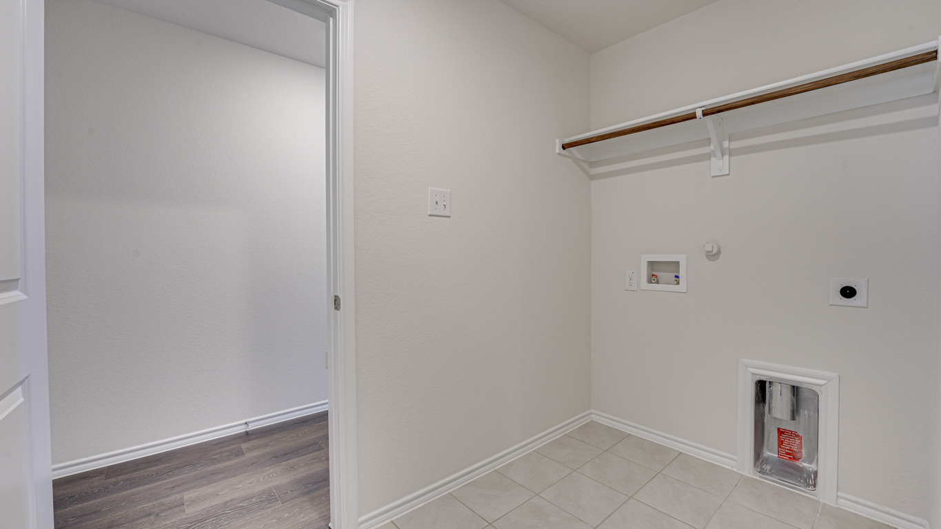 Welcome to The Amber at Blackhawk in Tucson, Arizona – a charming 1,331 sq. ft. single-story new home designed to offer both comfort and style in a prime location.  As you step through the front porch, you're greeted by an inviting entryway that opens up into a beautifully designed living space. The great room serves as the heart of the home, providing a spacious area for relaxing, entertaining, or enjoying family time. This open-concept design flows seamlessly into the dining area and kitchen.  The kitchen is a true centerpiece, featuring elegant quartz countertops, modern appliances, a pantry for ample storage, and a convenient breakfast bar. Whether you’re preparing a quick meal or hosting a dinner party, this kitchen is equipped to meet your needs with both style and functionality.  Just off the great room, you’ll find the primary bedroom – a private retreat designed for relaxation. The primary bedroom is generously sized and includes a walk-in closet and an en-suite bathroom, offering both luxury and convenience.   The Amber also includes two additional bedrooms, well-positioned to share a full bathroom. These rooms are ideal for family members, guests, or even a home office.  For added convenience, the home includes a utility room located near the bedrooms, and a two-car garage that offers both storage and functionality. Step outside to the covered patio, where you can unwind and enjoy Tucson’s beautiful weather year-round. Whether you’re sipping your morning coffee or hosting a weekend barbecue, this outdoor space extends your living area into the serene surroundings of Blackhawk.  Designed with energy efficiency in mind, The Amber at Blackhawk is a DOE Zero Energy Ready Home, ensuring long-term savings and a sustainable living environment.  *Images shown are for reference only. They depict the Amber model and may not represent the actual home.