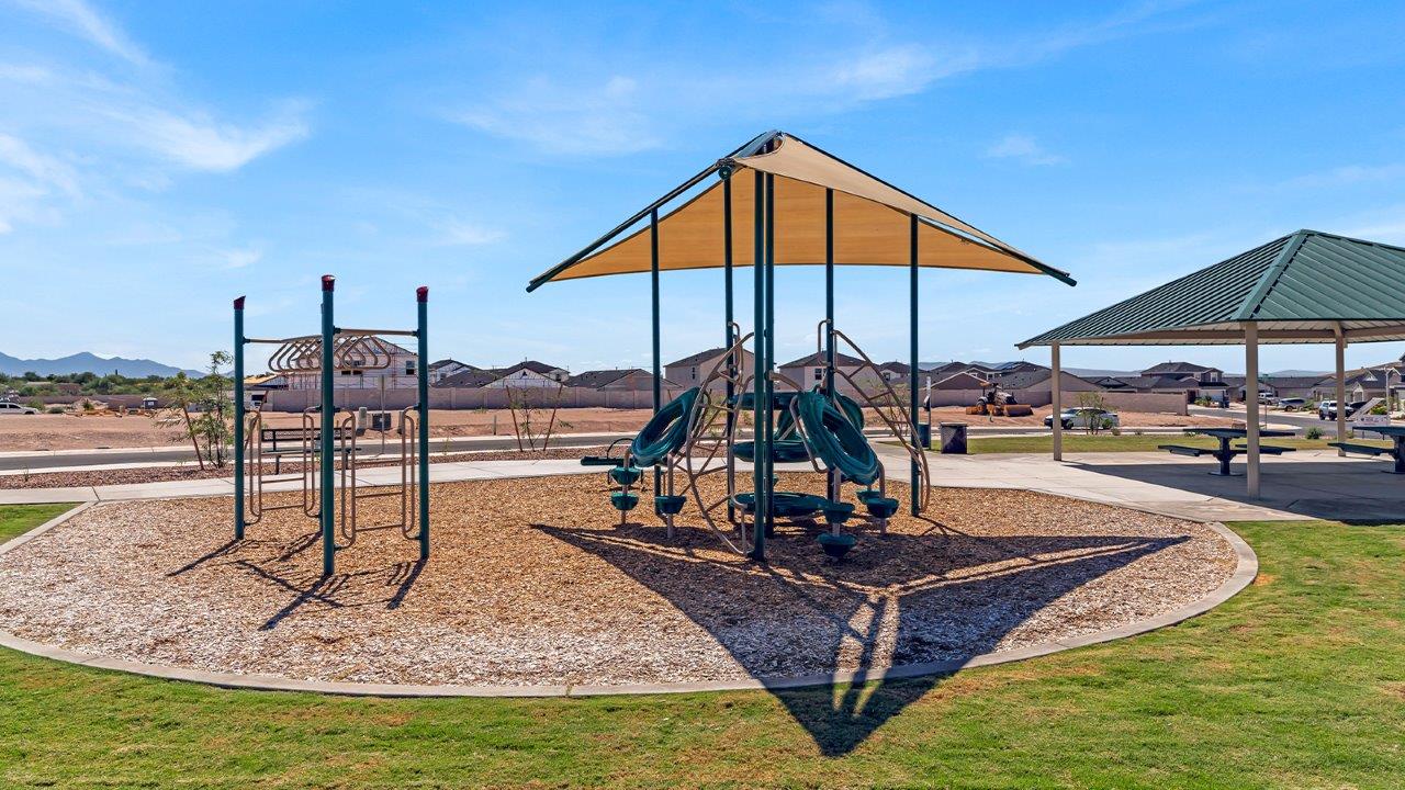 Welcome to The Amber at Blackhawk in Tucson, Arizona – a charming 1,331 sq. ft. single-story new home designed to offer both comfort and style in a prime location.  As you step through the front porch, you're greeted by an inviting entryway that opens up into a beautifully designed living space. The great room serves as the heart of the home, providing a spacious area for relaxing, entertaining, or enjoying family time. This open-concept design flows seamlessly into the dining area and kitchen.  The kitchen is a true centerpiece, featuring elegant quartz countertops, modern appliances, a pantry for ample storage, and a convenient breakfast bar. Whether you’re preparing a quick meal or hosting a dinner party, this kitchen is equipped to meet your needs with both style and functionality.  Just off the great room, you’ll find the primary bedroom – a private retreat designed for relaxation. The primary bedroom is generously sized and includes a walk-in closet and an en-suite bathroom, offering both luxury and convenience.   The Amber also includes two additional bedrooms, well-positioned to share a full bathroom. These rooms are ideal for family members, guests, or even a home office.  For added convenience, the home includes a utility room located near the bedrooms, and a two-car garage that offers both storage and functionality. Step outside to the covered patio, where you can unwind and enjoy Tucson’s beautiful weather year-round. Whether you’re sipping your morning coffee or hosting a weekend barbecue, this outdoor space extends your living area into the serene surroundings of Blackhawk.  Designed with energy efficiency in mind, The Amber at Blackhawk is a DOE Zero Energy Ready Home, ensuring long-term savings and a sustainable living environment.  *Images shown are for reference only. They depict the Amber model and may not represent the actual home.