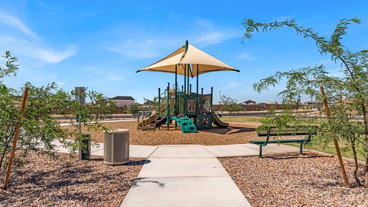 Welcome to The Diana at Blackhawk in Tucson, Arizona – a spacious 1,558 sq. ft. single-story new home designed to offer comfort, style, and energy efficiency in a prime location.  As you enter through the inviting front porch, you're greeted by a well-designed entryway that leads into an open-concept living area. The great room is the centerpiece of the home, providing a generous space for relaxing, entertaining, or enjoying quality time with family. It seamlessly flows into the dining area and kitchen, creating a bright and welcoming atmosphere perfect for any occasion.  The kitchen is thoughtfully designed with modern touches, including elegant granite countertops, a pantry for ample storage, and a large island with a breakfast bar that makes both meal preparation and casual dining a breeze. The open layout ensures that the kitchen is always connected to the rest of the living space, making it easy to interact with family and guests.  Adjacent to the great room, you’ll find the master suite, offering a private retreat within the home. The master bedroom is generously sized, featuring a spacious walk-in closet and an en-suite bathroom with dual vanities and a walk-in shower, providing both luxury and convenience.  The Diana also includes two additional bedrooms, well-positioned to share a full bathroom. These rooms are ideal for family members, guests, or even a home office, offering flexible living options to suit your needs.  A utility room and a two-car garage add to the home’s practicality, ensuring that daily routines are efficient and organized. Step outside to the covered patio, where you can unwind and enjoy Tucson’s beautiful weather, whether it’s a quiet morning coffee or an evening gathering with friends.  Designed with energy efficiency in mind, The Diana at Blackhawk is a DOE Zero Energy Ready Home, ensuring long-term savings and a sustainable living environment.