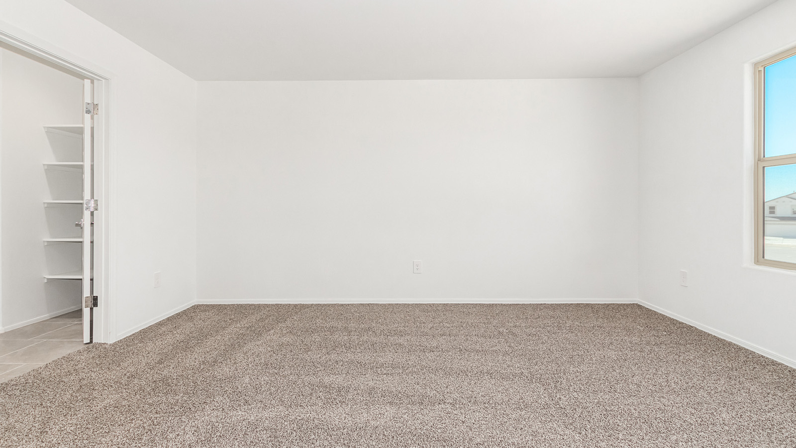 Introducing The Grace at Blackhawk in Tucson, Arizona – a spacious 1,963 sq. ft. two-story new home designed to accommodate modern living with style and functionality.  As you step through the welcoming front porch, you’re greeted by an open and inviting entryway that leads directly into the heart of the home. The main level features a spacious great room that flows seamlessly into the dining area and the modern kitchen, creating a perfect space for entertaining and family gatherings. The kitchen is equipped with elegant granite countertops, a large island with a breakfast bar, modern appliances, and a pantry that offers plenty of storage, making it as functional as it is stylish.  The main floor also includes a convenient powder room for guests, and direct access to the two-car garage, enhancing the home’s functionality and ease of living.  Heading upstairs, you'll discover the family’s private quarters. The master suite is a serene retreat, featuring a generously sized bedroom, a large walk-in closet, and an en-suite bathroom complete with dual vanities and a walk-in shower. The upper level also includes three additional bedrooms, a full bathroom, and a utility room conveniently located for easy access to all bedrooms. Additionally, a versatile loft area serves as a flexible space that can be used as a game room, home office, or even a second living area.  Back downstairs, step outside from the great room to the covered patio, where you can enjoy Tucson’s beautiful weather year-round. Whether you’re hosting an outdoor gathering or simply relaxing after a long day, this space extends your living area and enhances the home’s inviting ambiance.  Designed with energy efficiency in mind, The Grace at Blackhawk is a DOE Zero Energy Ready Home, ensuring sustainability, comfort, and long-term savings.